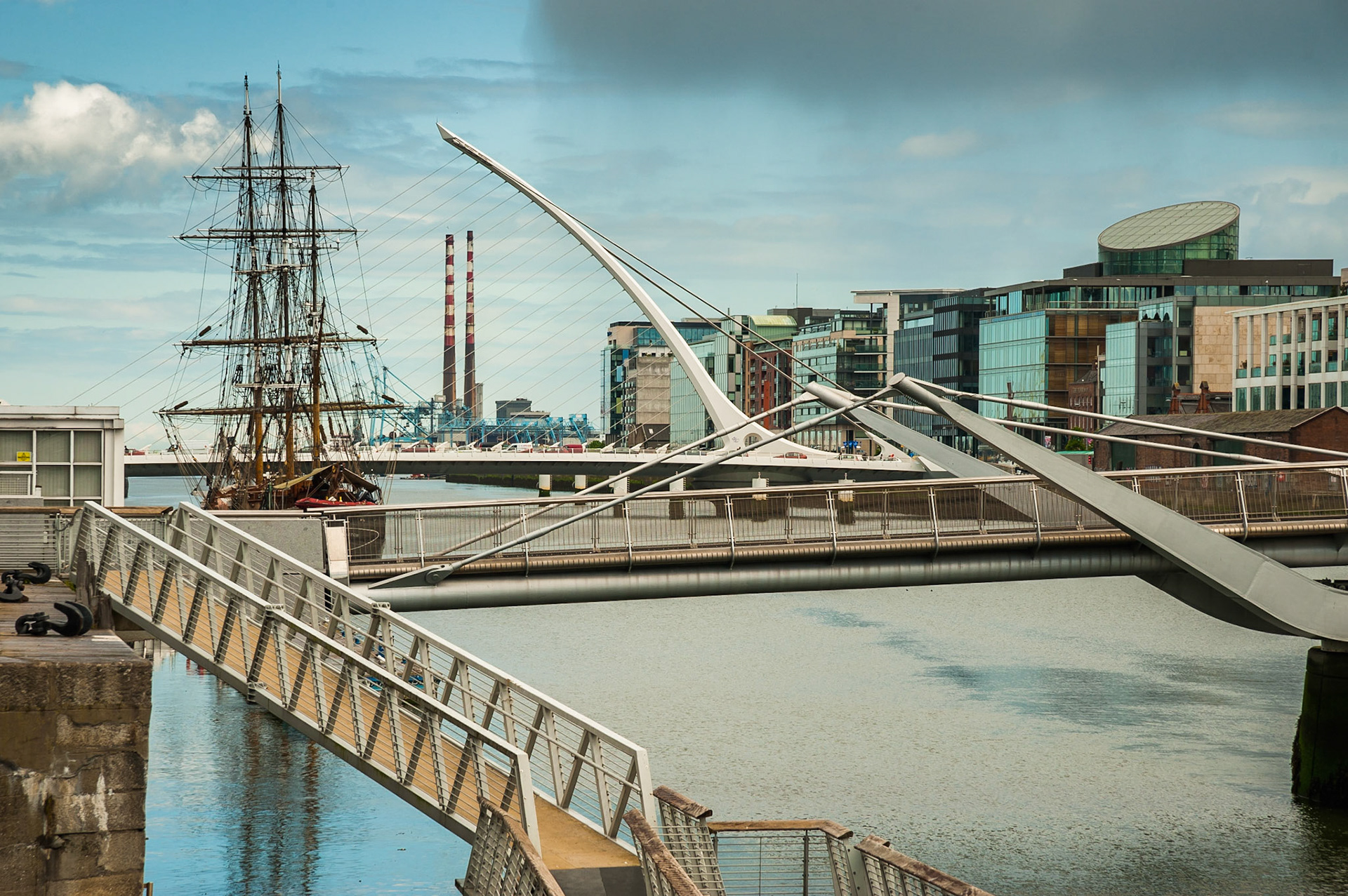 A fresh afternoon walk in the city of Dublin, in between the rain showers of course. The iconic twin chimney stacks of Dublin port behind, and the Jeanie Johnston famine ship in the mid-ground.