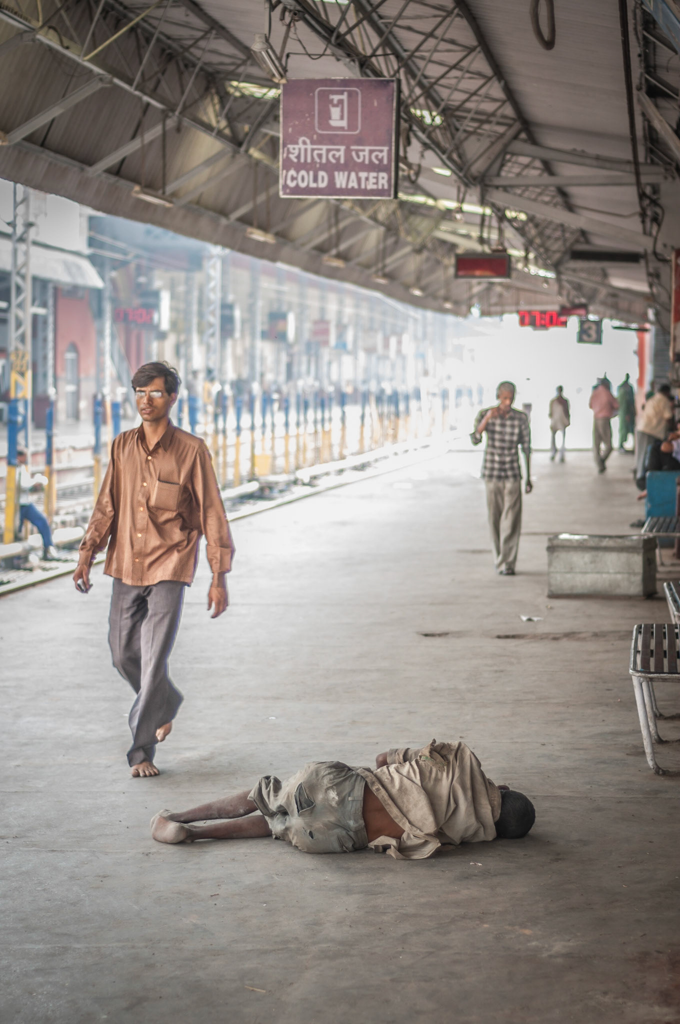 A favourite yet powerful image. This is the train station at Varanasi, India. With over 10 platforms, even more trains and very few signs in English this was a rather close call catching our train. While waiting the light on this platform was just incredible. Spreading right down the tracks, literally like a tunnel of light. But with the platform so dark the contrast was perfect for a high-key scene which I love. This is over 2 stops of exposure compensation to blow out the highlights. This poor guy was in a bad bad way on the platform, and as I watched everyone who passed… only one person paid him any attention. This is the world we live in.