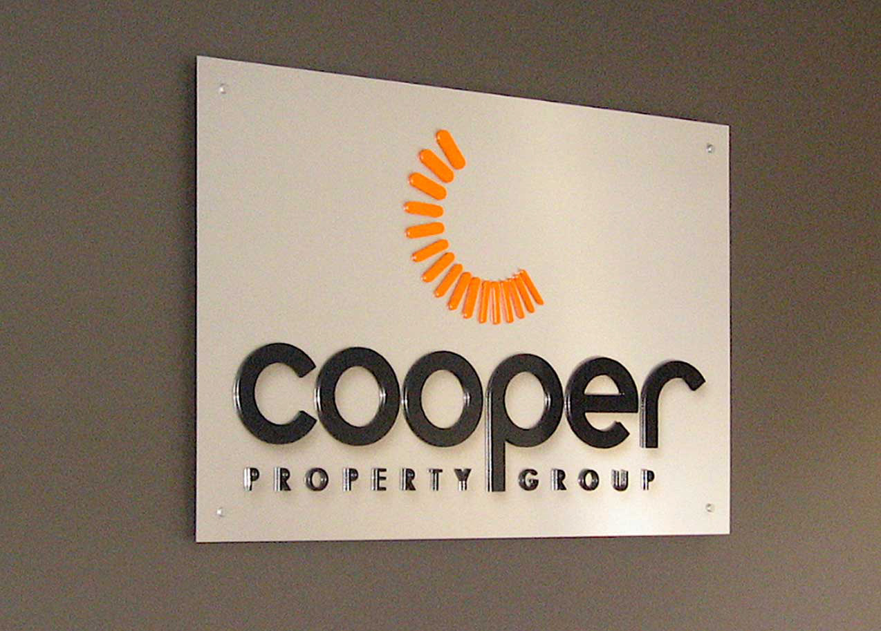 Cooper Property Group reception sign with acrylic lettering