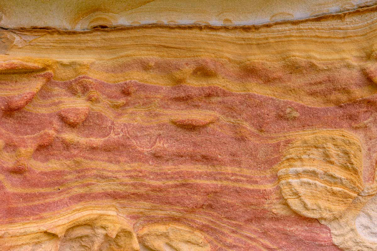 lines and structures in sandstone half-caves