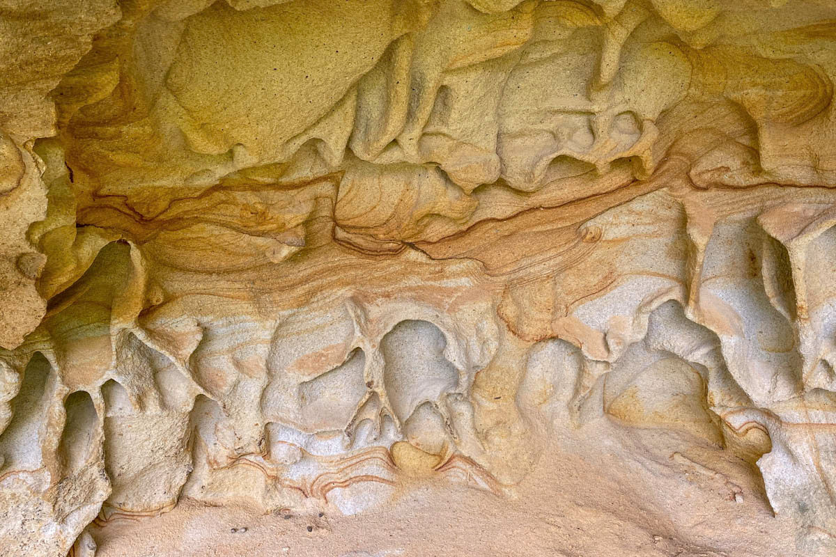 lines and structures in sandstone half-caves