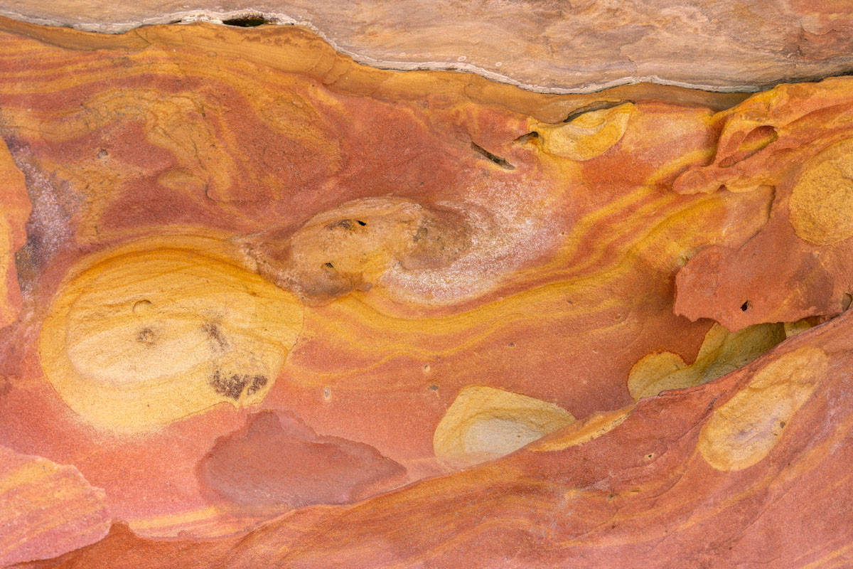 lines and structures in sandstone half-caves