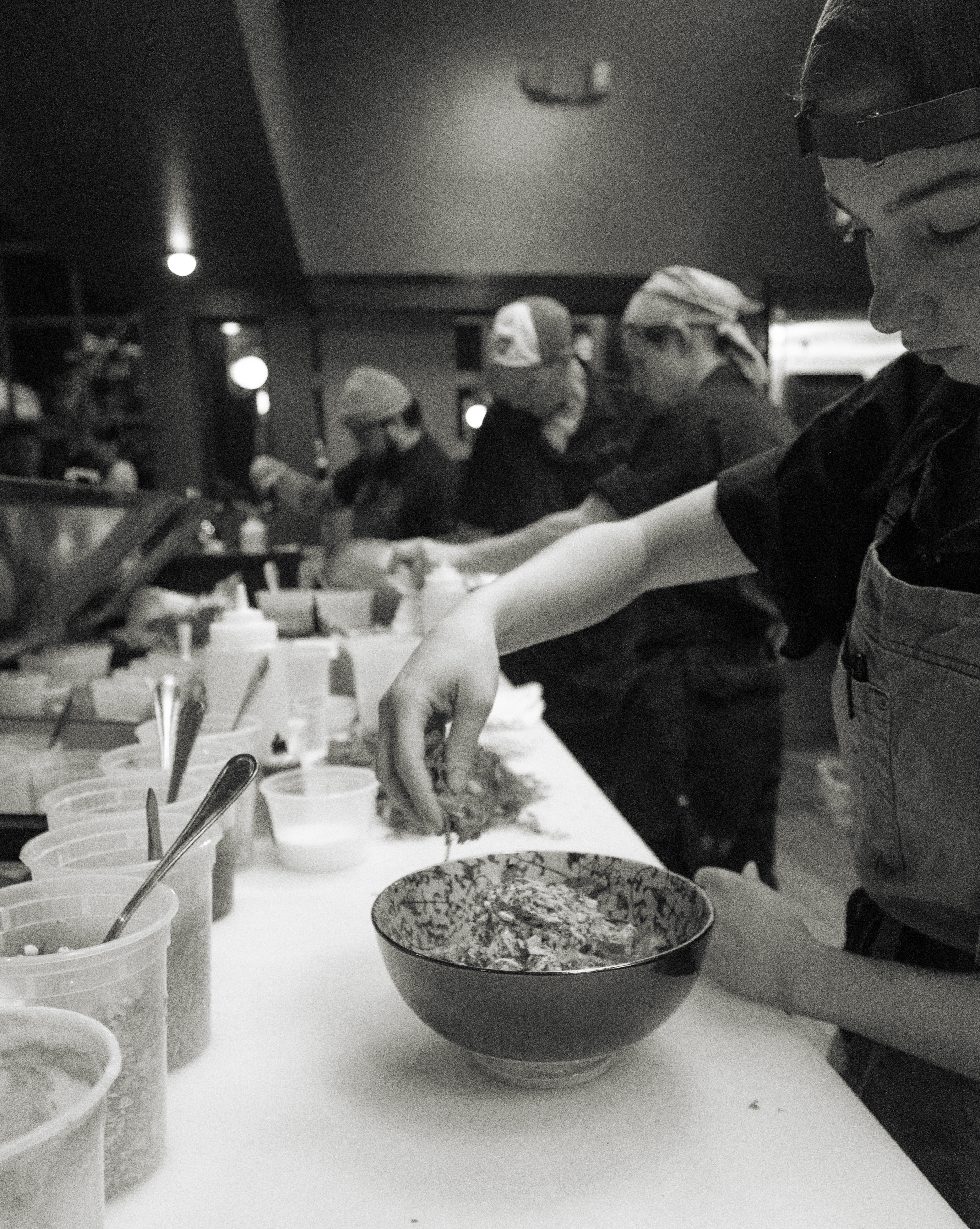 From left: Chef Kenny Nguyen, Chef Bradley Austin, Chef Ryan Mikulka, and Chef Lauren LaBarre prepare food for those dining at Pretty Boy, the new Vietnamese restaurant in downtown Athens, Georgia on Nov. 14, 2024. 
