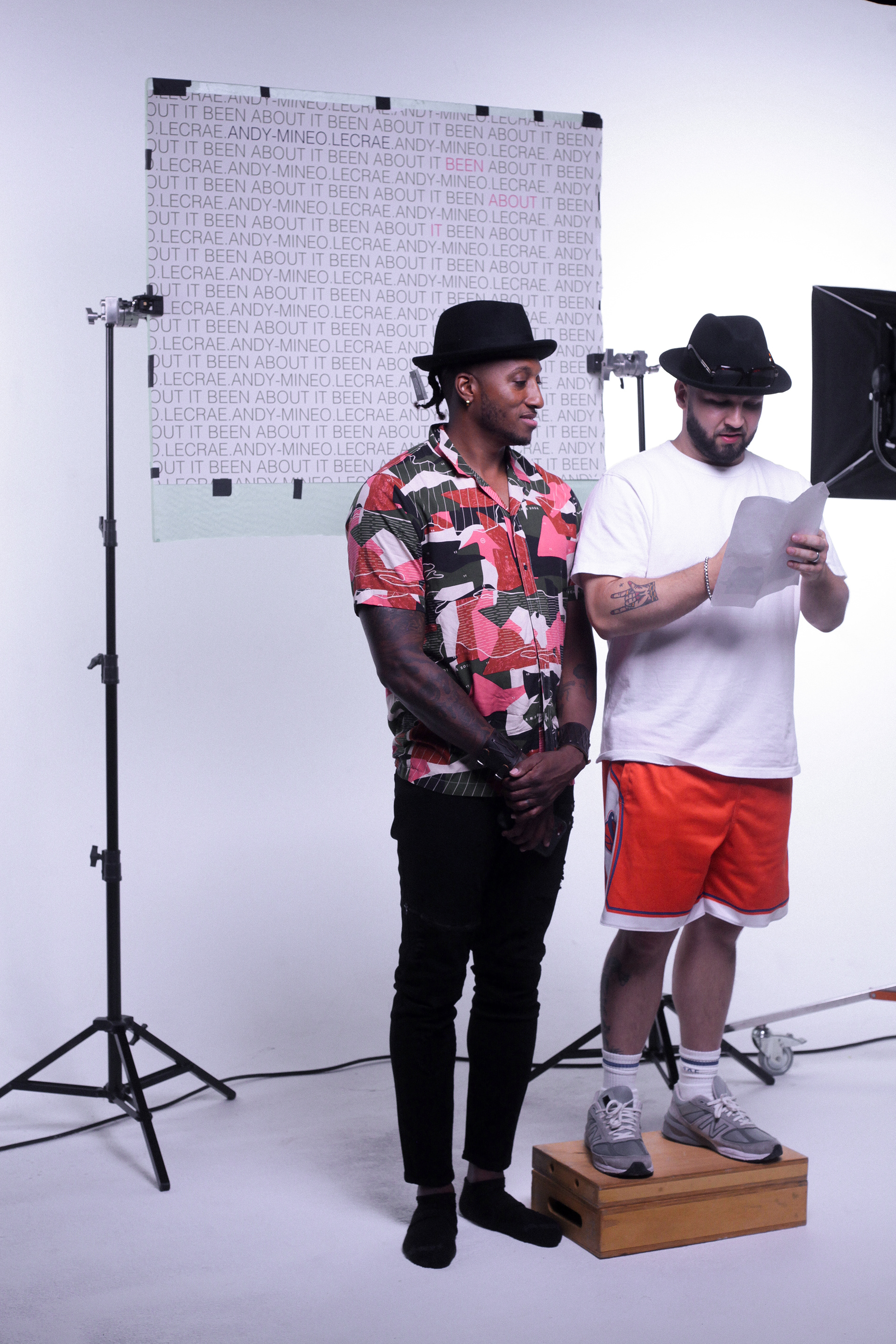 From left: Christian rap artists Lecrae and Andy Mineo prepare to recreate Run DMC's "King of Rock" album cover on set for their "Been About It" music video in Atlanta, Ga on July 28, 2021. 