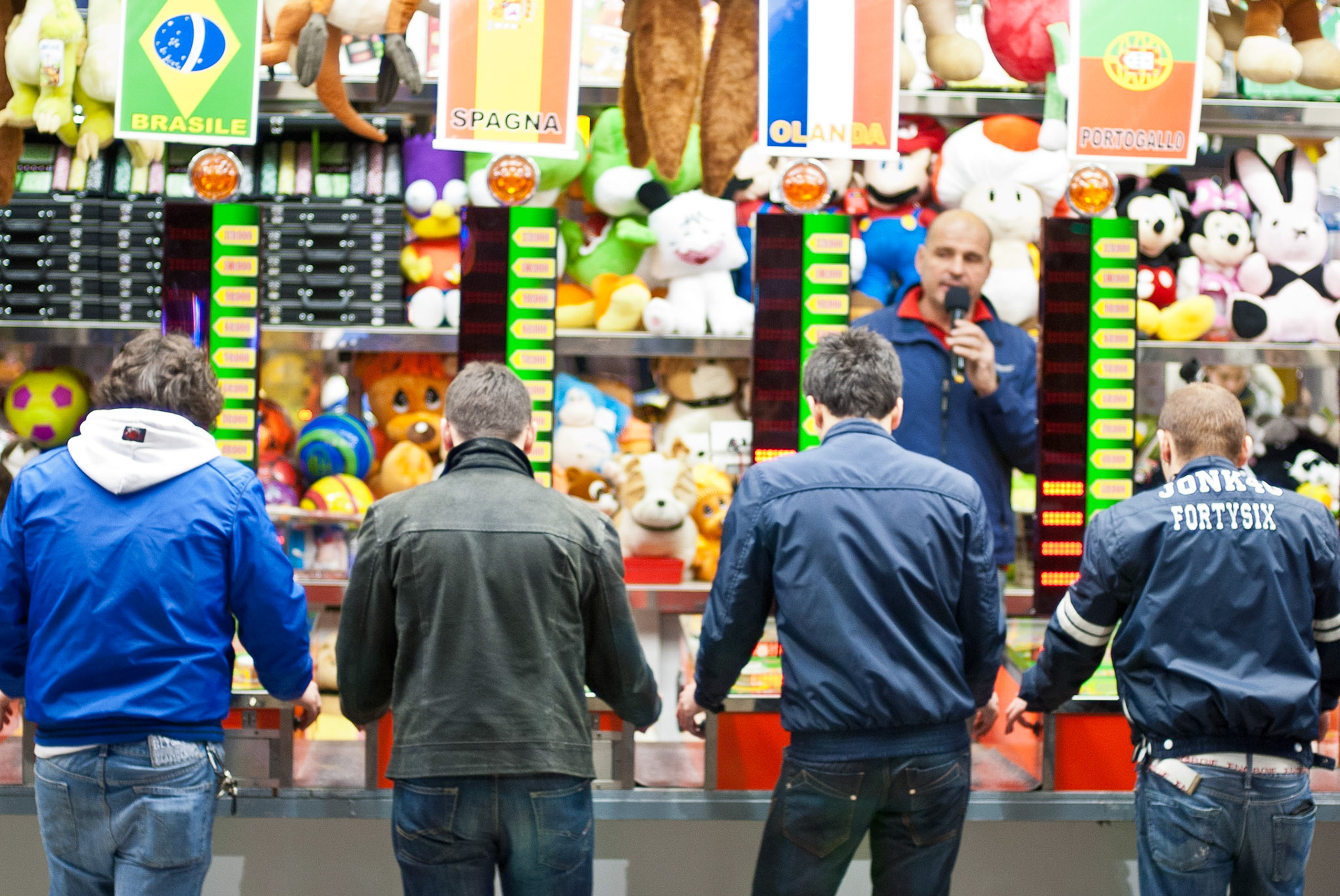 Men playing carnival games.