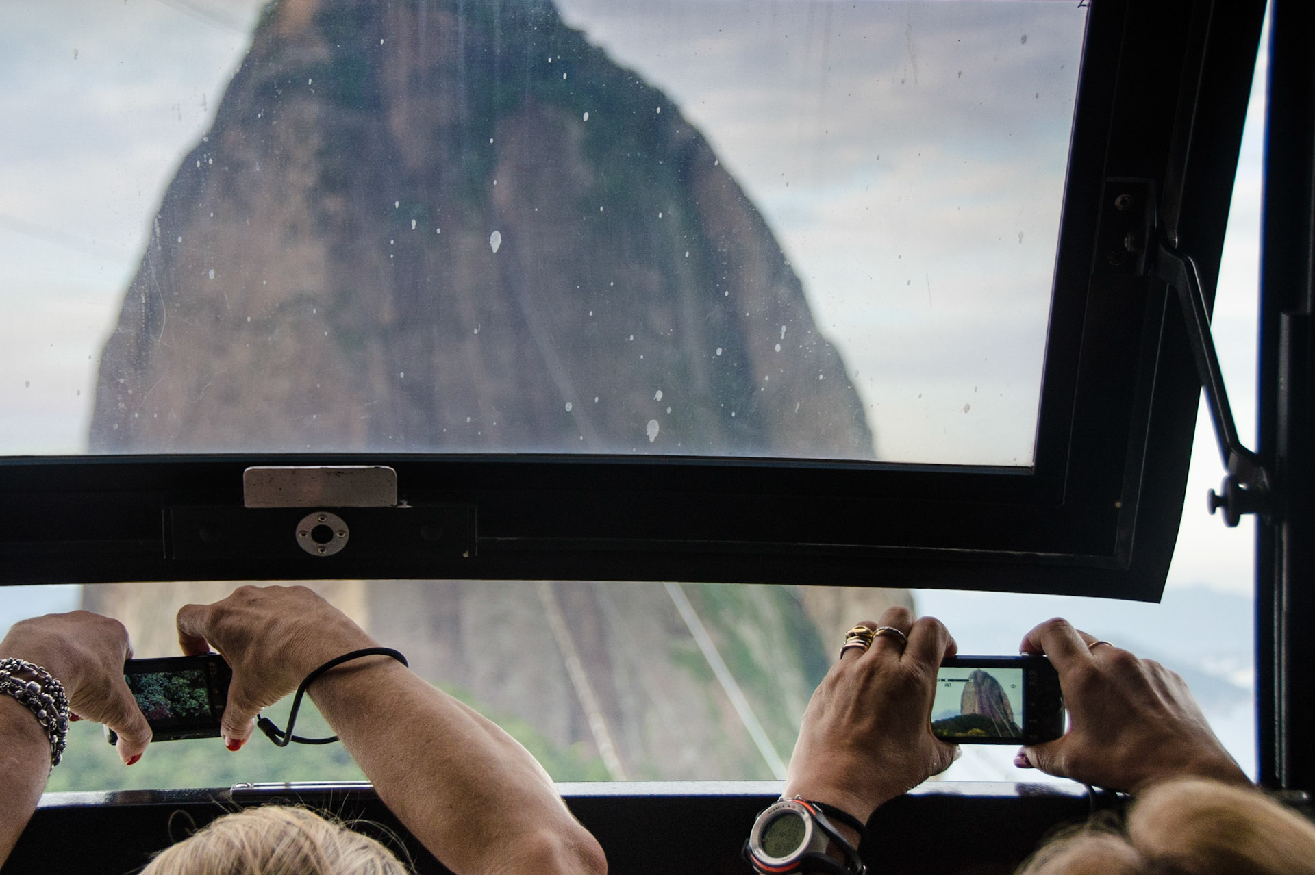 Tourist take the cable car to Sugar Loaf Mountain in Rio de Janeiro, Brazil