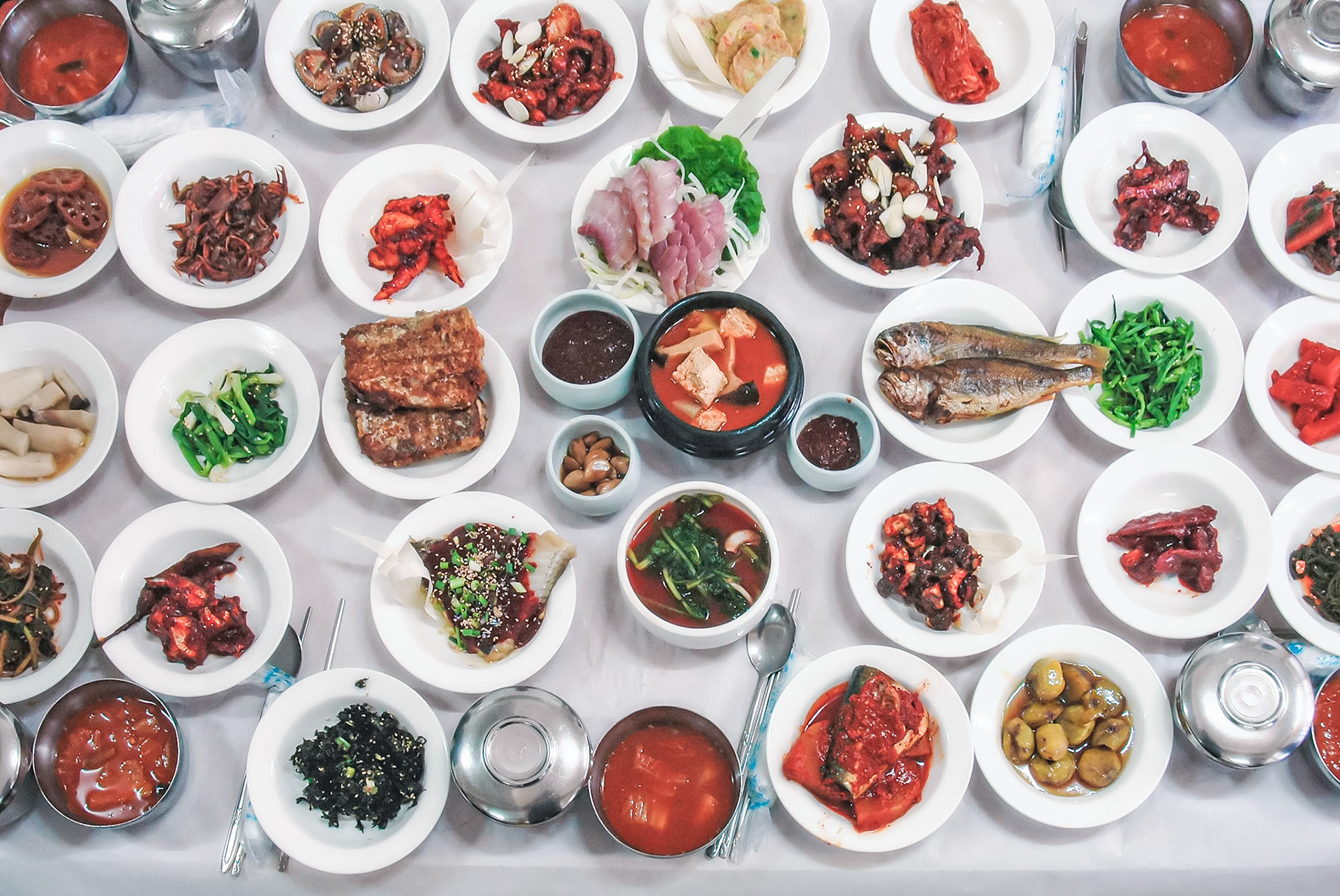 Korean dishes laid out for a feast