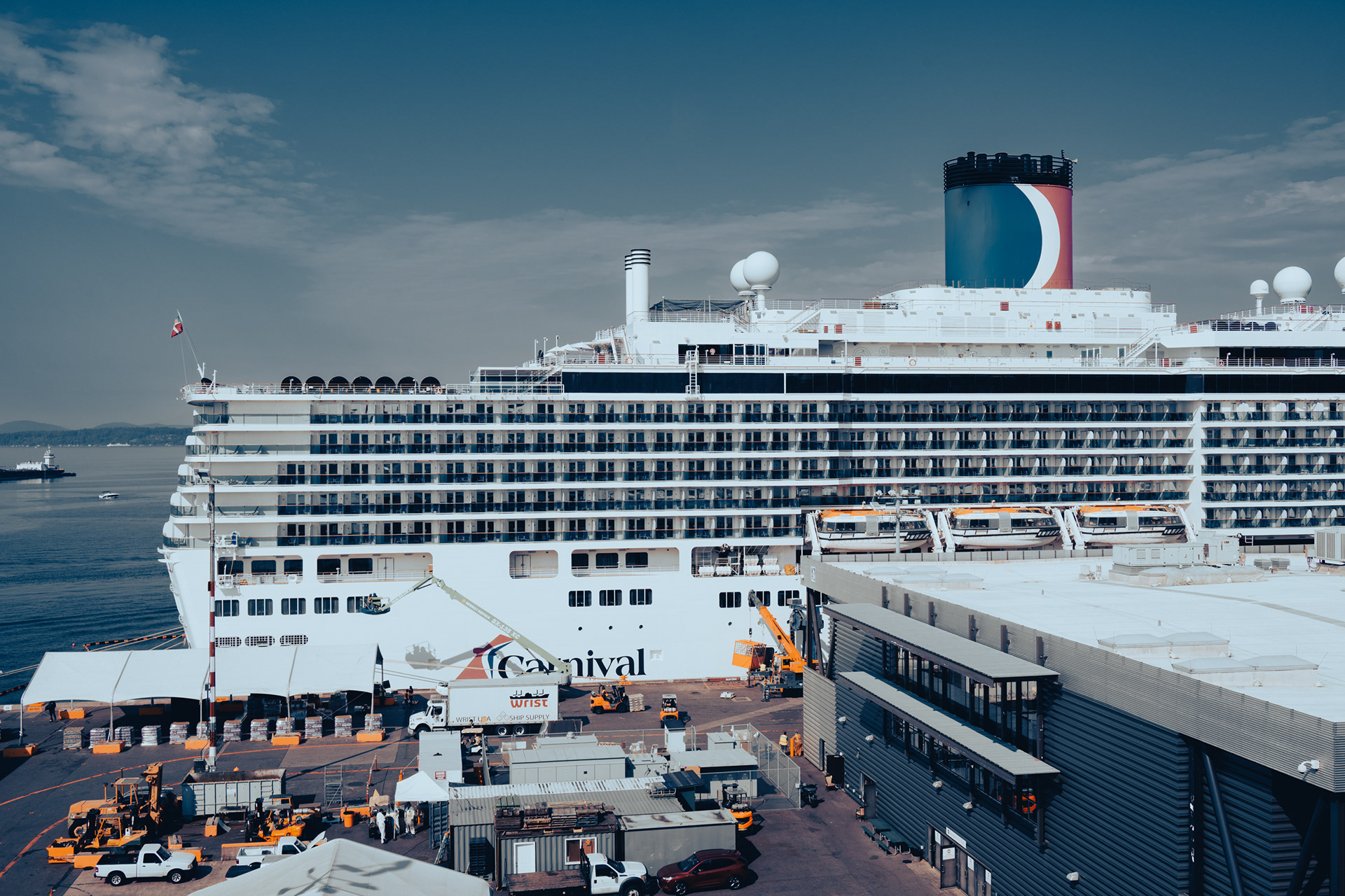 Carnival Luminosa at another dock