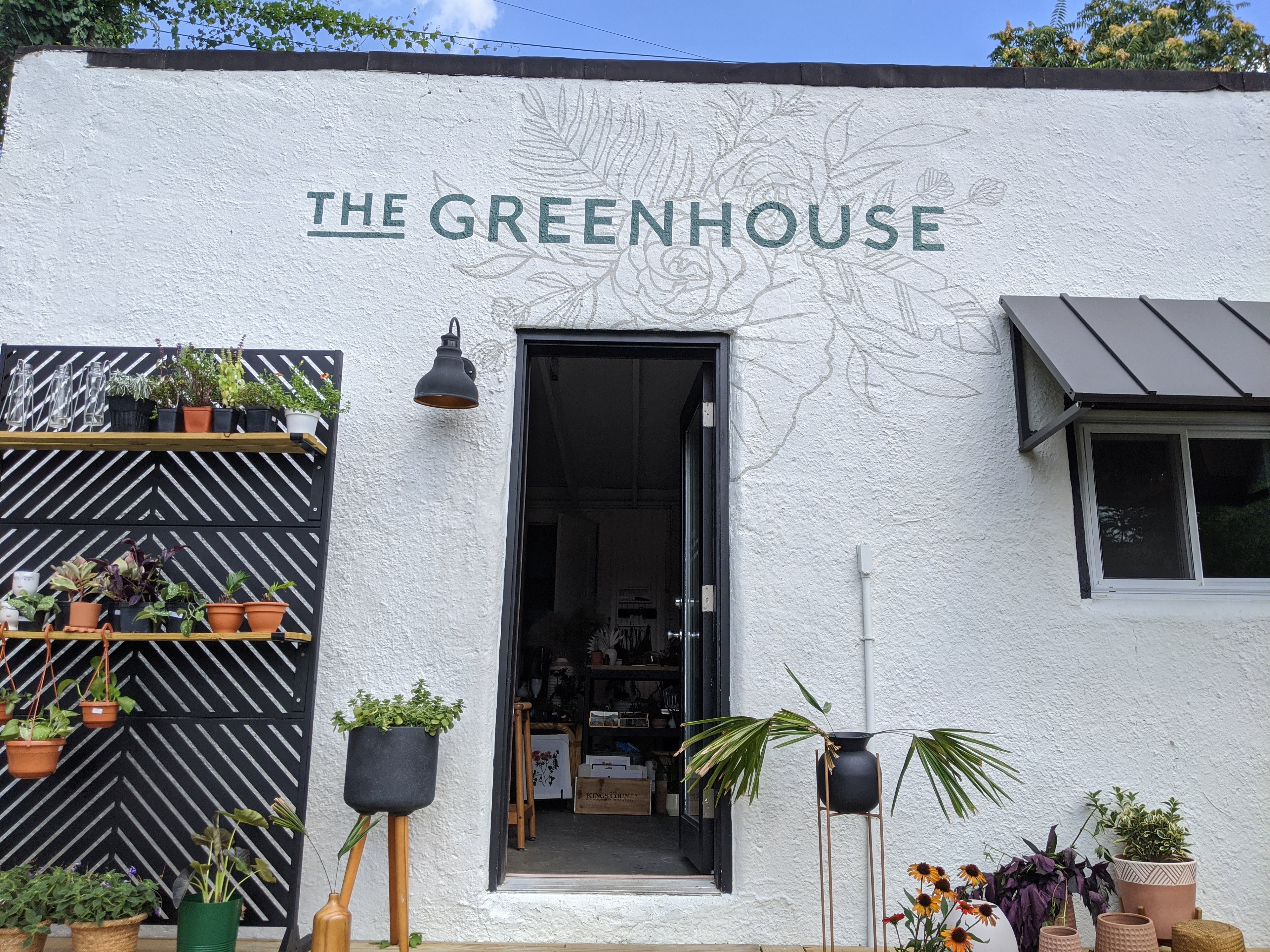 The Greenhouse in Baltimore's signage. Design by Brianna Mark, painted by me.