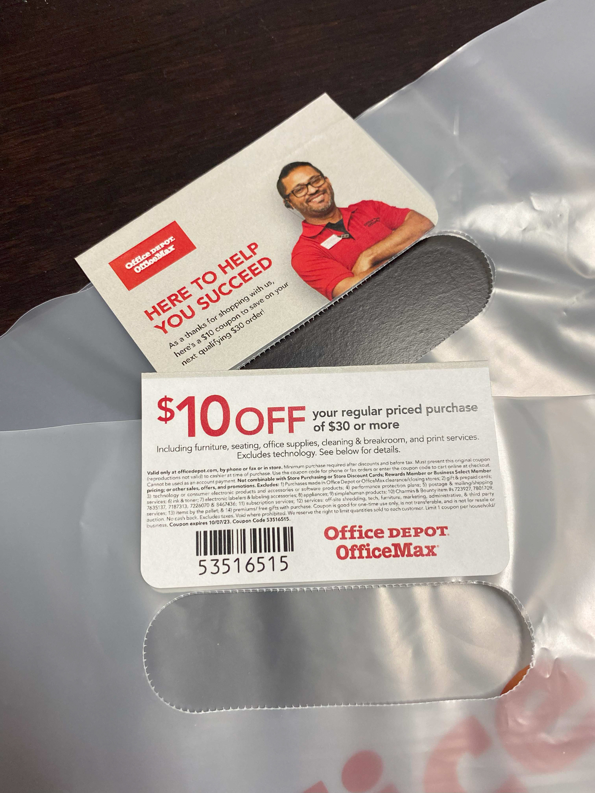 Close up view of stickers showcasing front and back of the seals.