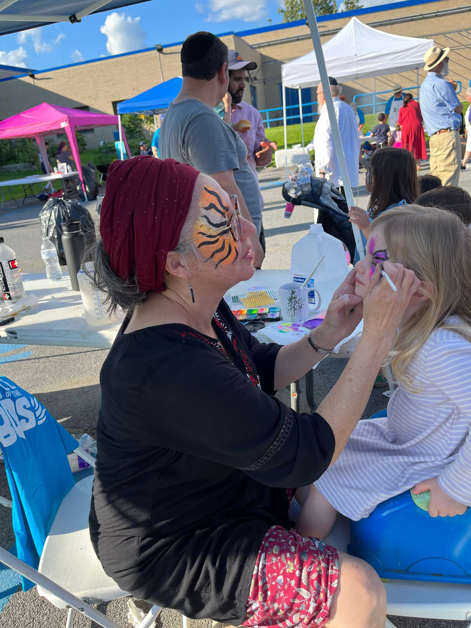 Face-painting at a community program