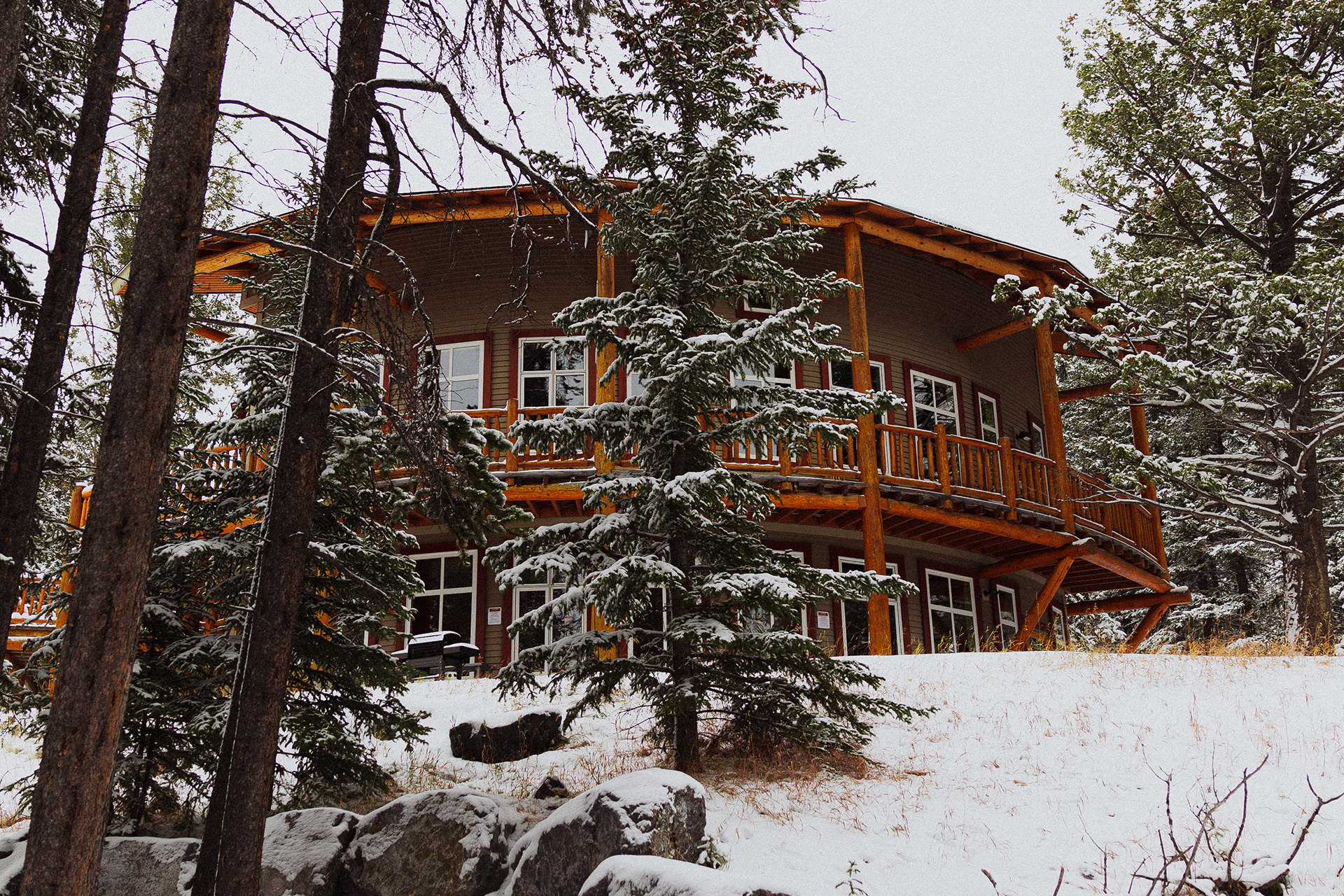The HI hostel in Banff looking very wintery after a night of snow.
