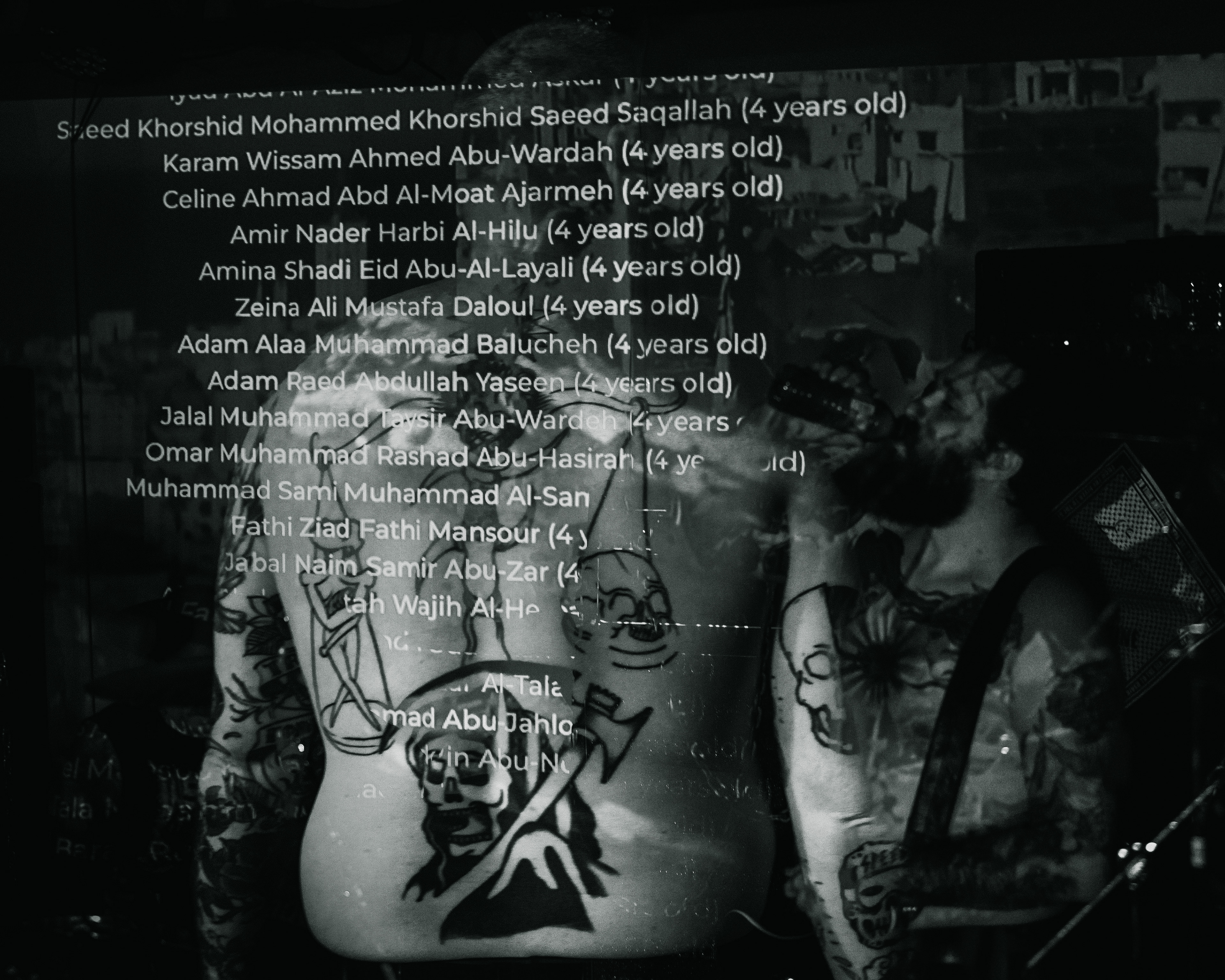 Balkan - Astoria - Vancouver - in camera double exposure of the vocalist overlayed with projected text