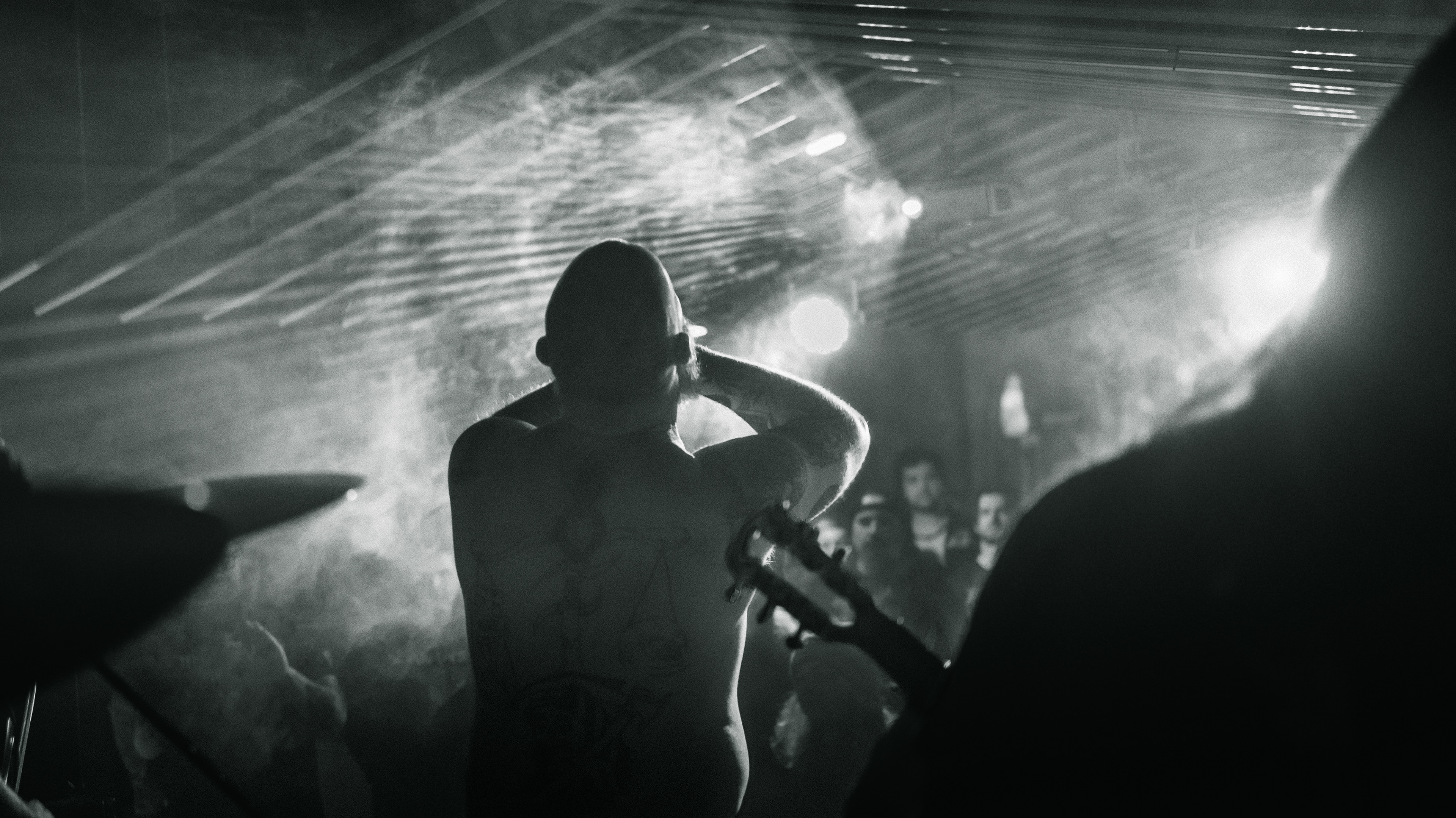 Balkan - Astoria - Vancouver -The vocalist sings to a smoke filled room in front of the crowd