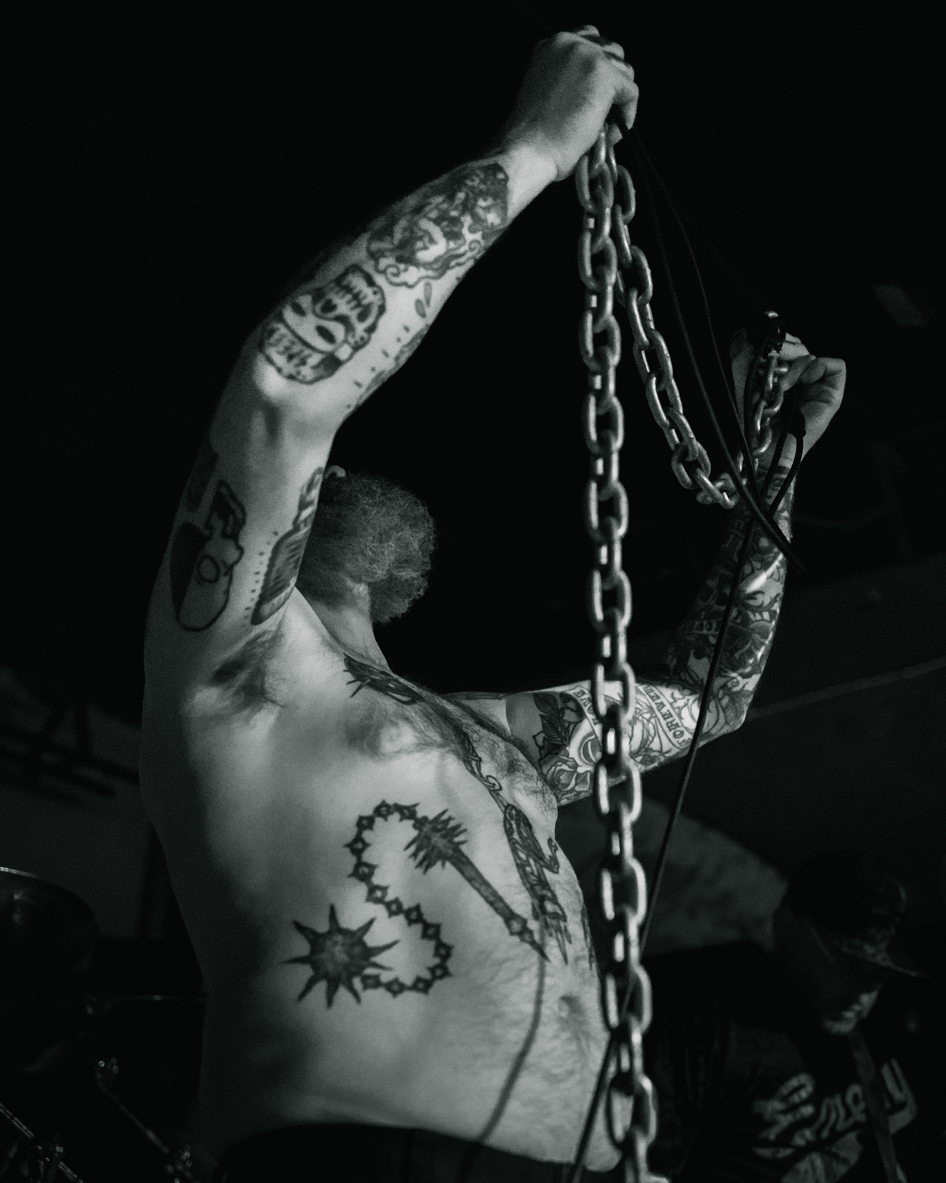 Balkan - Astoria - Vancouver - the singer holds a chain 