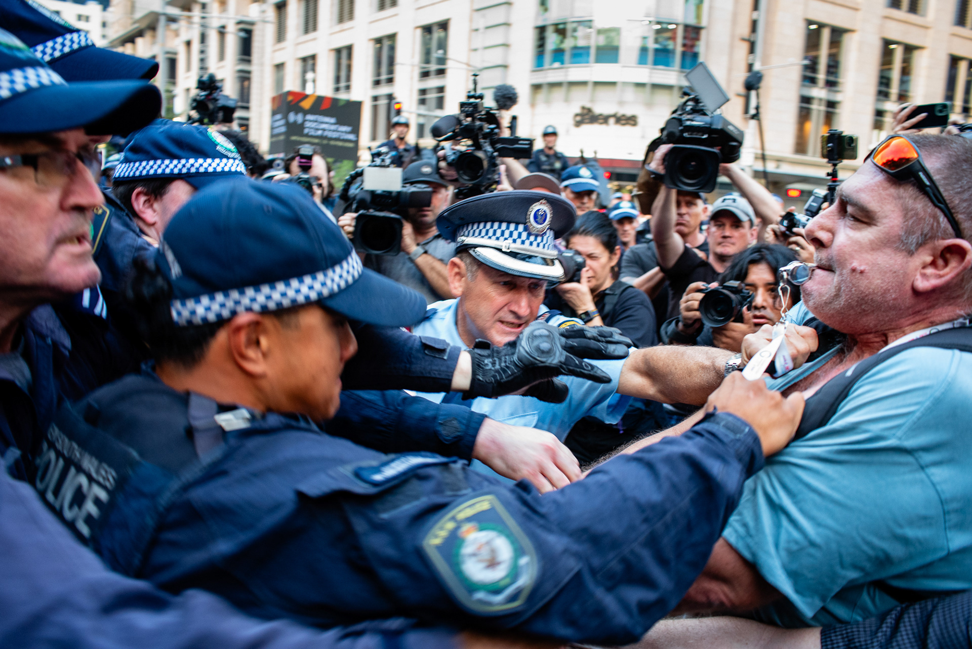 Sydney, Australia. 9 February 2026. Protesters clash with NSW Police during a demonstration opposing the visit of Israeli President Isaac Herzog outside Sydney Town Hall. 