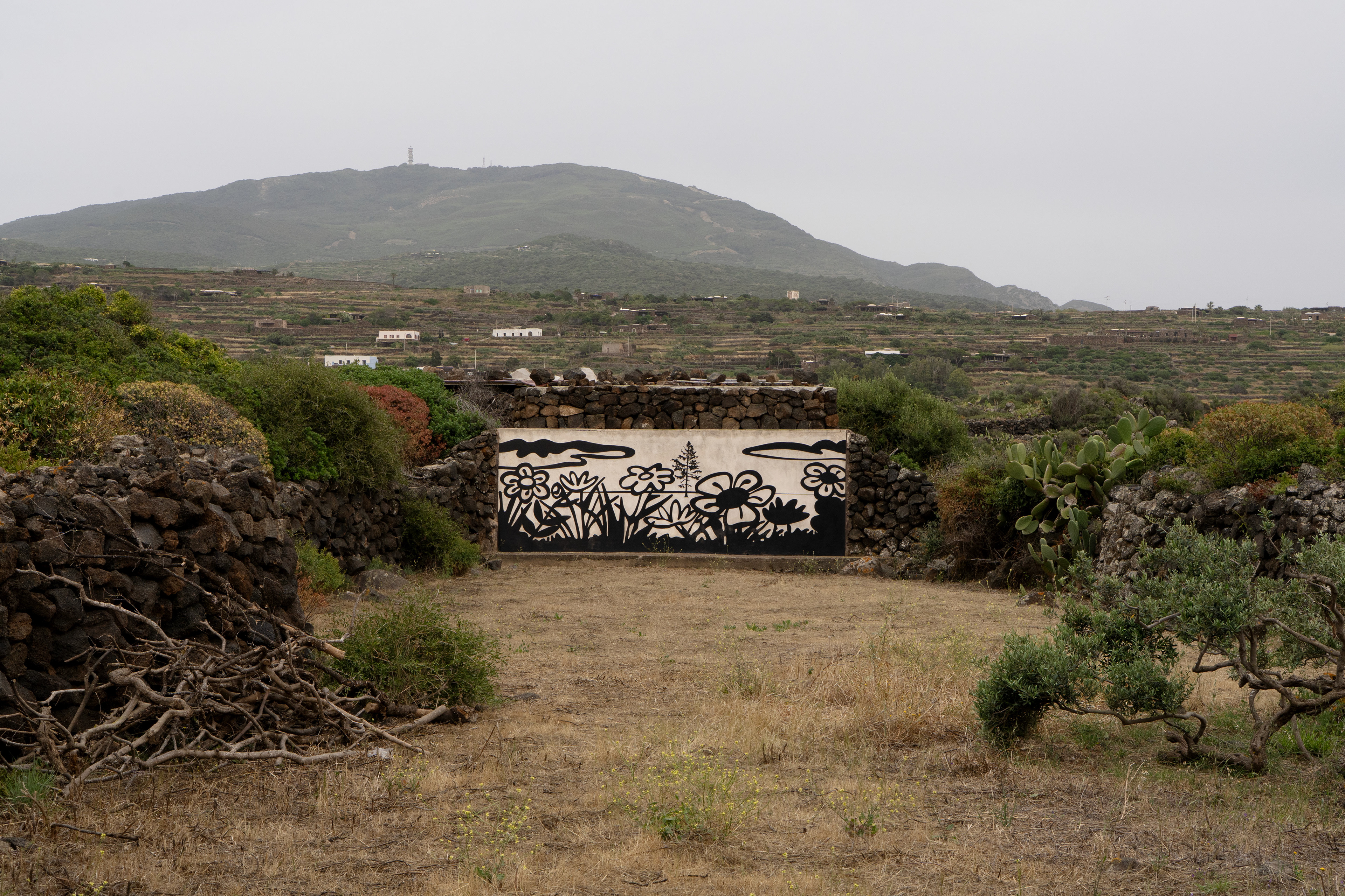 Shooting commissioned by Airbnb Experiences in 2025 at La Collina di Loredana in Pantelleria, a four-hectare land art park and open-air museum founded by Attilio Rappa.