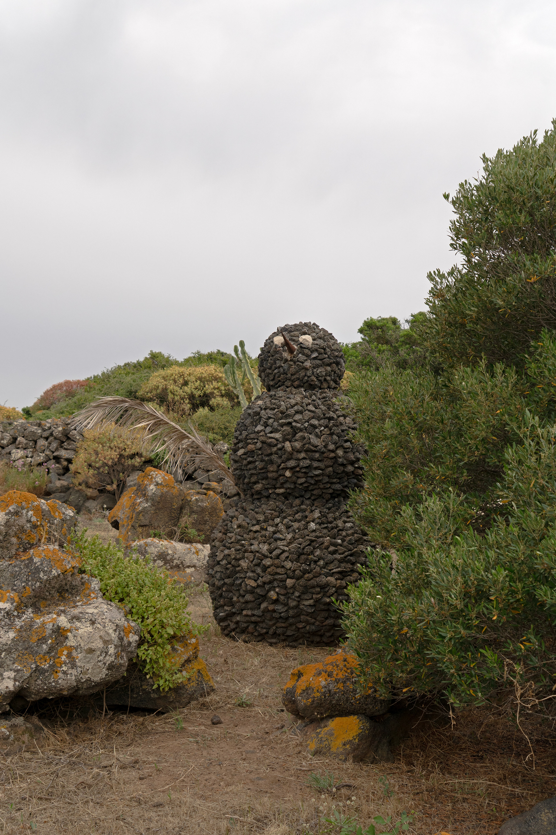 Shooting commissioned by Airbnb Experiences in 2025 at La Collina di Loredana in Pantelleria, a four-hectare land art park and open-air museum founded by Attilio Rappa.