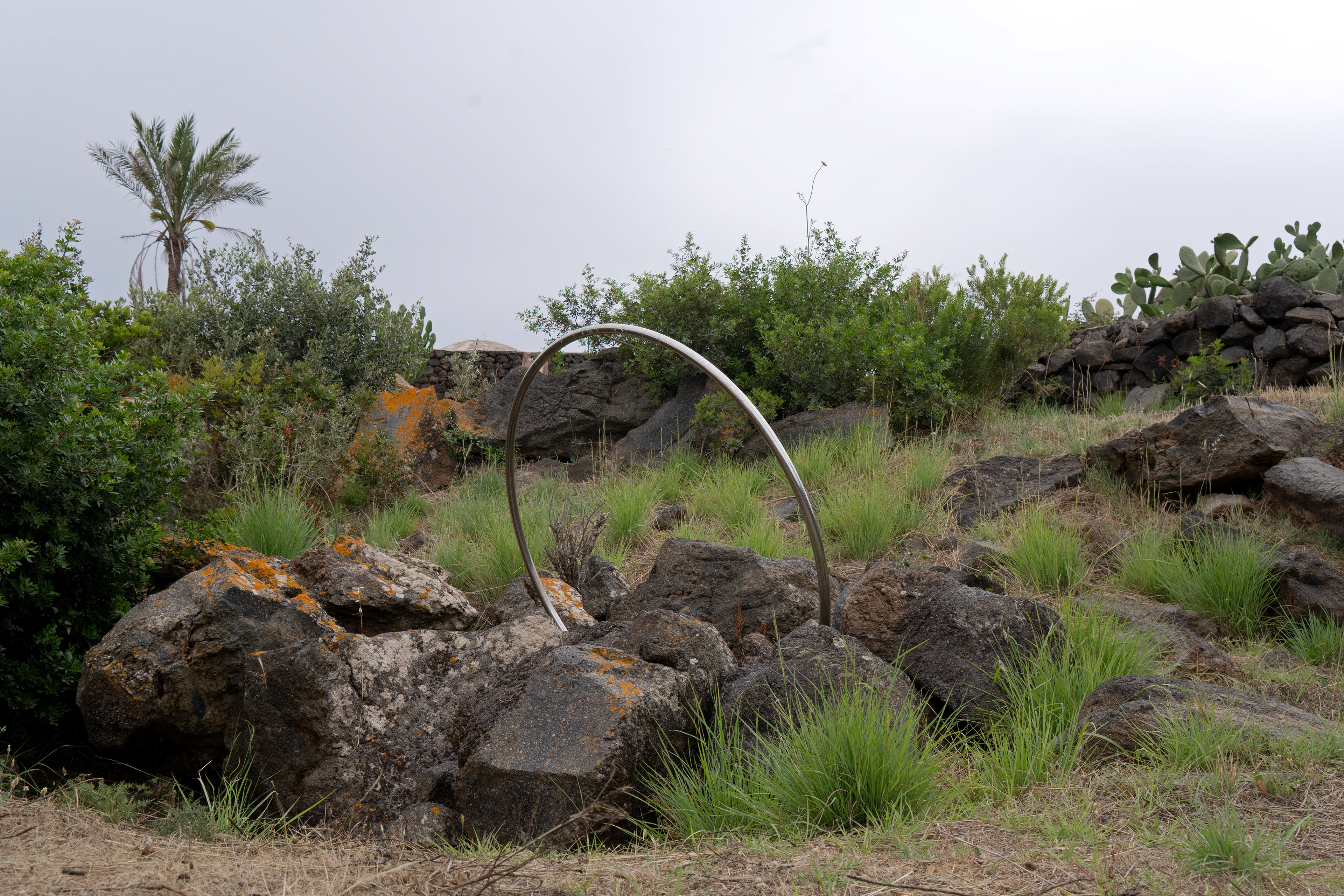 Shooting commissioned by Airbnb Experiences in 2025 at La Collina di Loredana in Pantelleria, a four-hectare land art park and open-air museum founded by Attilio Rappa.
