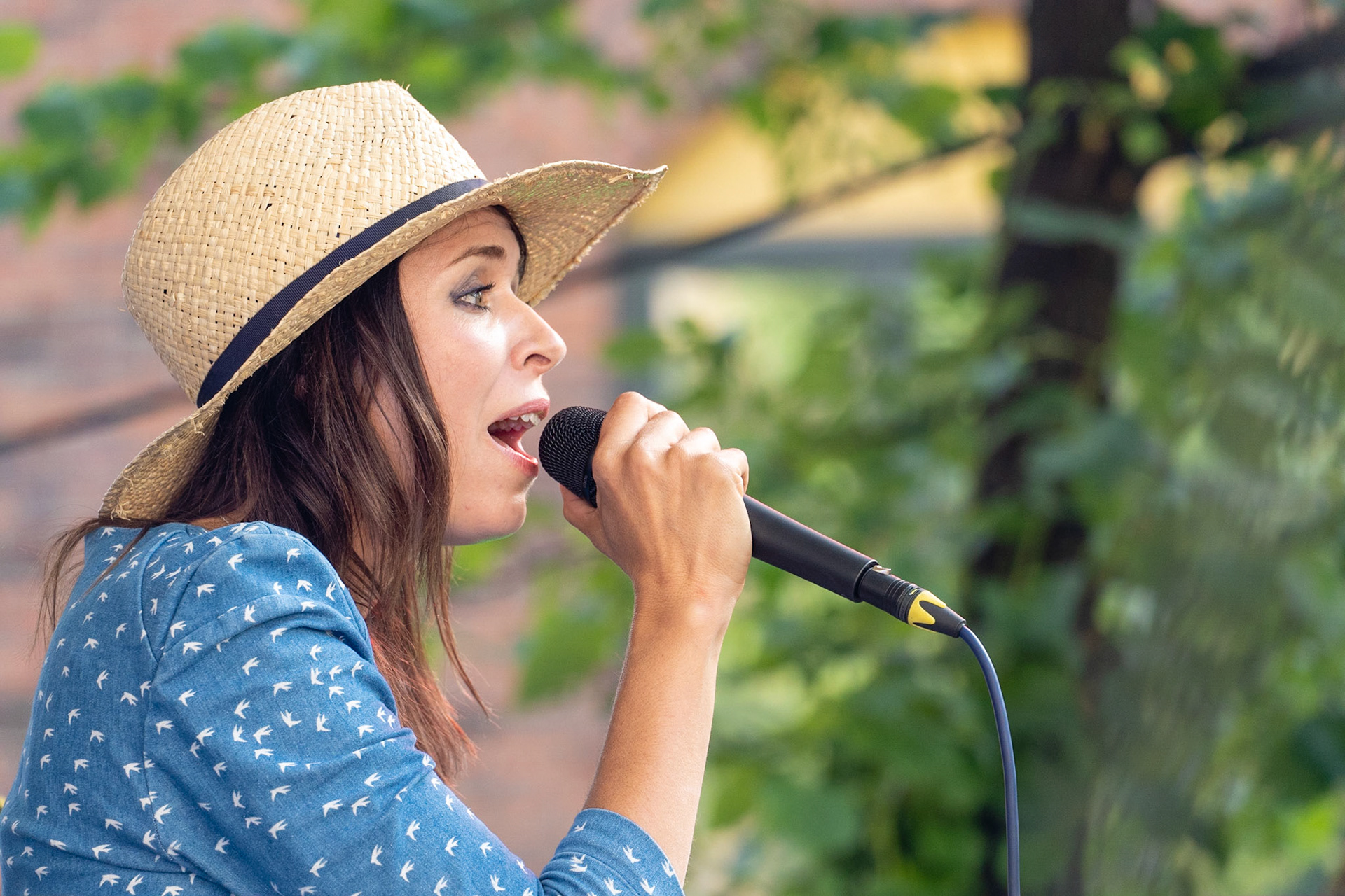 Danish singer Kira Skov on stage with Howe Gelb and Gustaf Ljunggren during Copenhagen Jazz Festival on Balders Plads (Balder's Square), Copenhagen