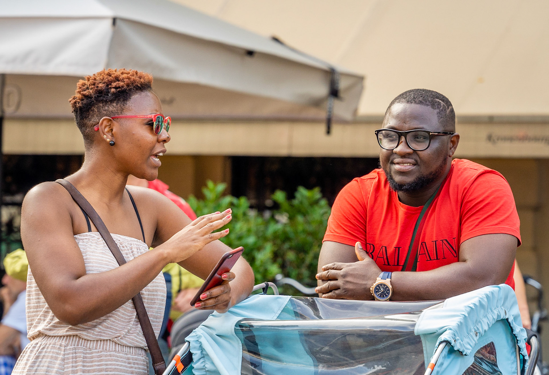 Man and woman of African origin hanging talking, having a good time at Couleur Cafe 2018 in Copenhagen