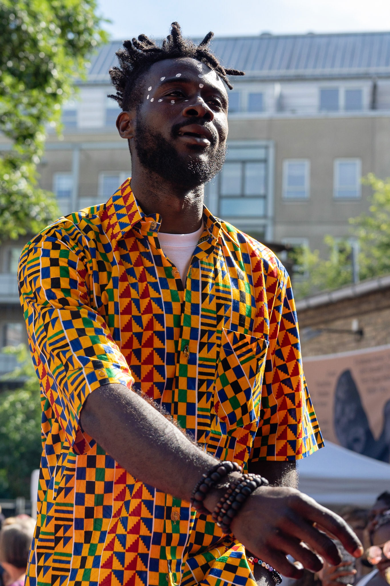 Male model af African origin showing African fashion on the catwalk at fashion show during Couleur Cafe 2018 in Copenhagen