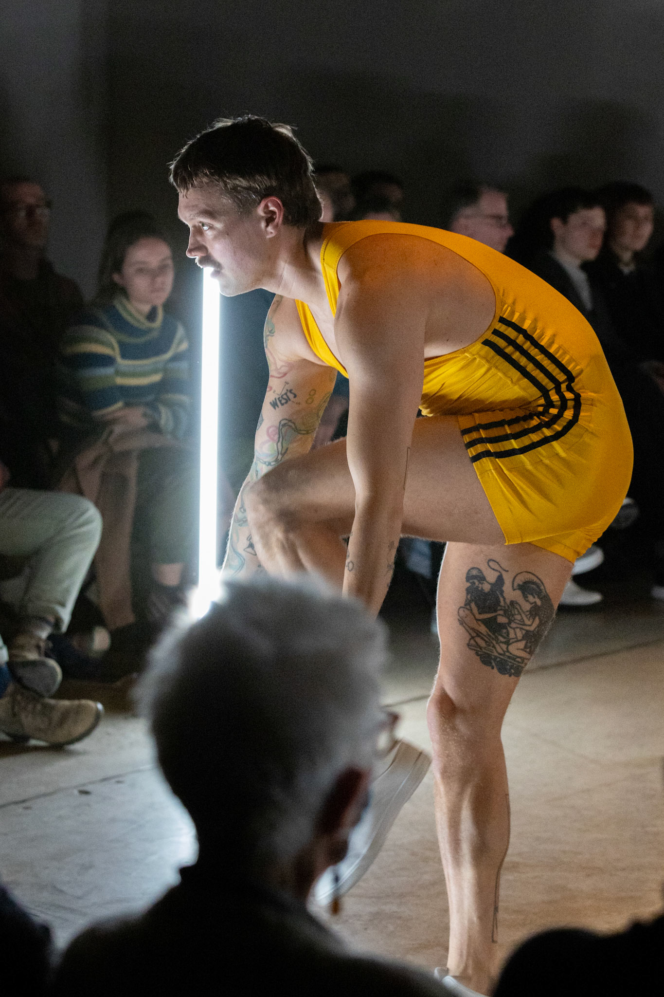 On April 11, 2025, at Cove Street Arts in Portland, Maine, “Bunk Beds” unfolded as an intimate, physical meditation on queer longing, devotion, and choreographic legacy. Directed by Tristan Koepke and created in collaboration with James Barrett, Emilia Bruno, Marc Macaranas, Daniel Miramontes, Benny Olk, and Curtis Thomas, the performance drew on the lives and love of Merce Cunningham and John Cage, Instagram thirst traps, and the radical possibilities of relationship anarchy.With live music composed and performed by Ethan Philbrick, lighting and production design by Audrey Kastner, and dramaturgy by Rebecca Steinberg, the piece layered movement, sound, and image into a performance that felt both deeply personal and expansively collective.