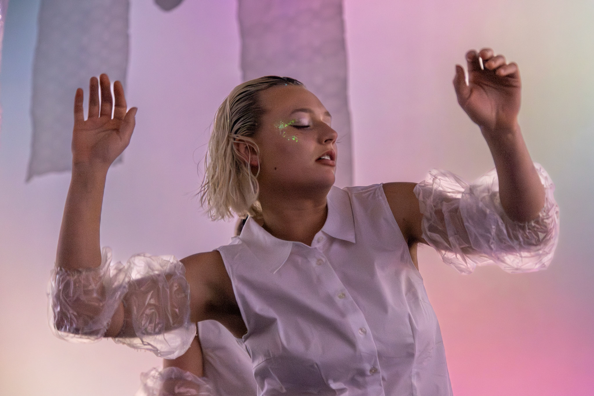 LEWISTON, Maine – Dancers perform in My Love Is Like Eternity, a choreographic thesis by Lola Buczkowski ’25, on Feb. 12, 2025, at Bates College’s Coram Library Immersive Media Studio. The durational performance invites audiences to experience movement up close in an intimate setting. (Photo by Sammy Weidenthal 2027 for Bates College)