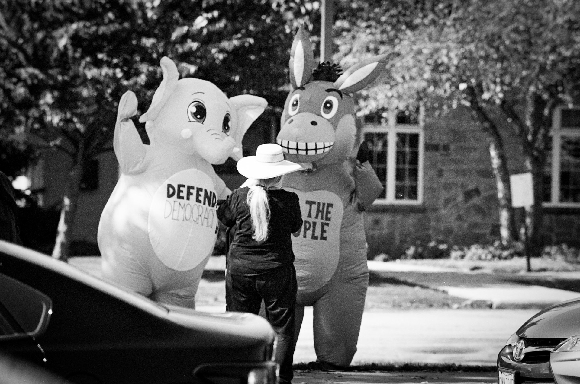Protesters line SOM Center Road in Solon, OH on October ## 2025 to demonstrate against the Trump presidency and newly implemented policies on immigration.