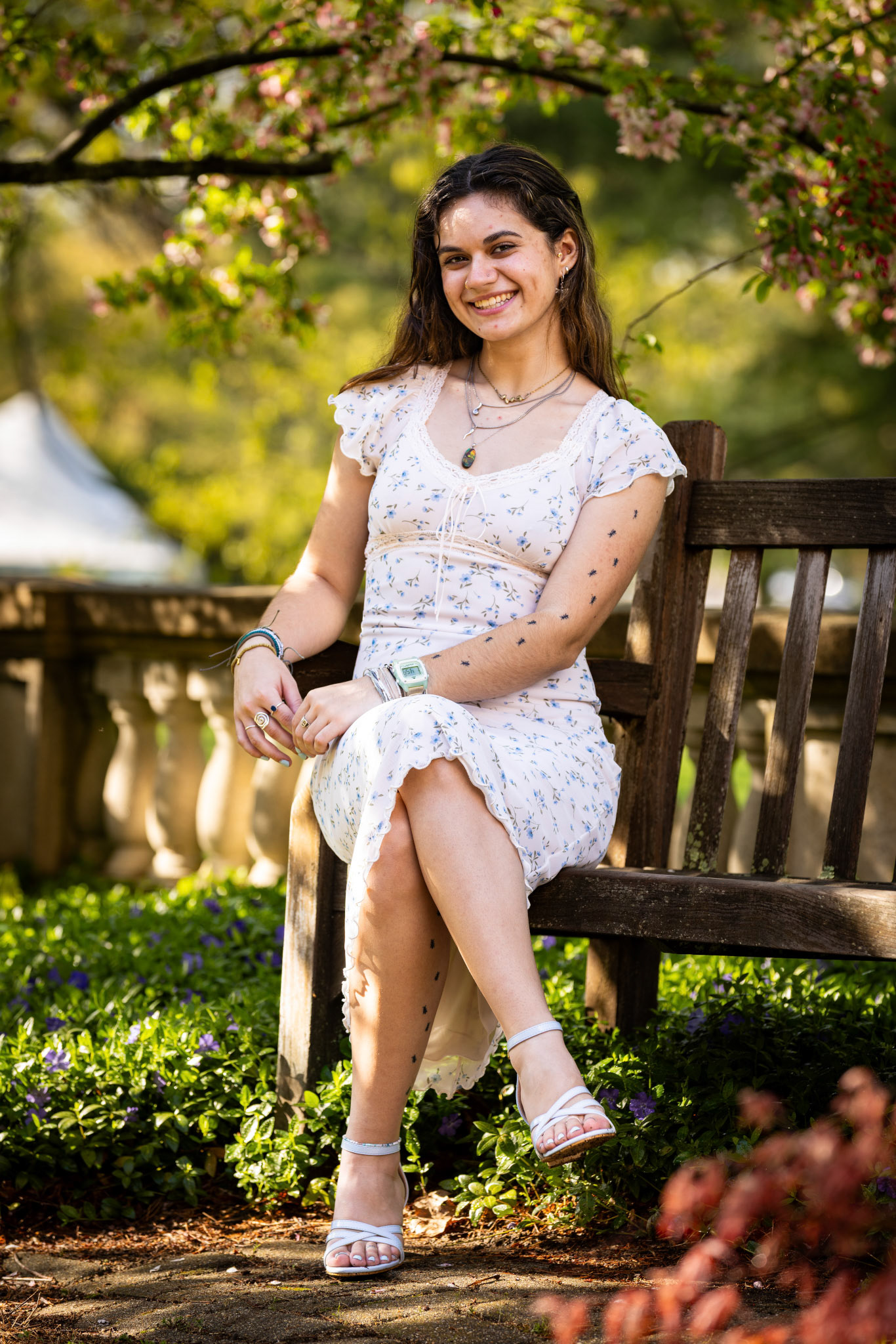 Madelynn Peabody class of 2026 poses for a grad shoot with photographer Sam Weidenthal at the UNH Durham campus.
