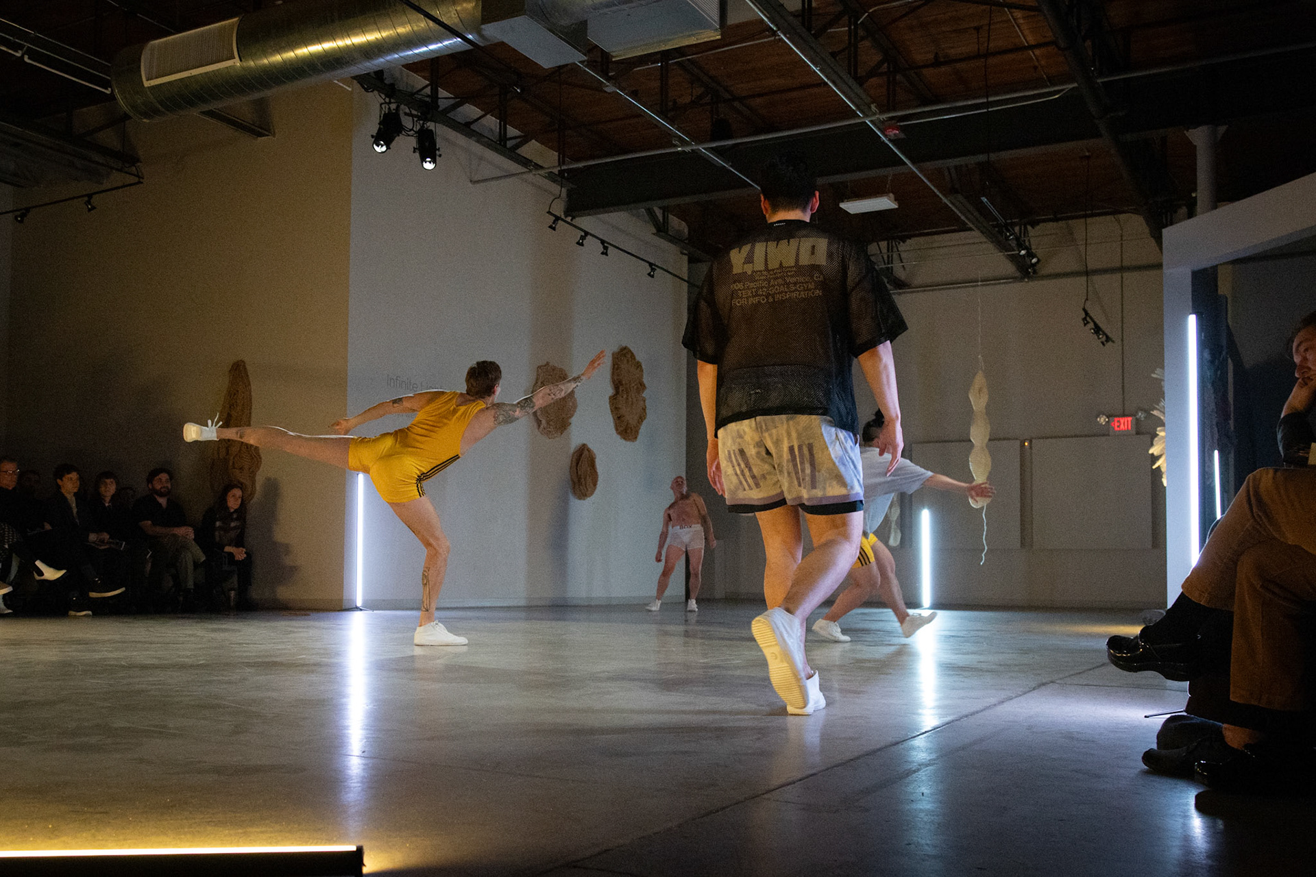 On April 11, 2025, at Cove Street Arts in Portland, Maine, “Bunk Beds” unfolded as an intimate, physical meditation on queer longing, devotion, and choreographic legacy. Directed by Tristan Koepke and created in collaboration with James Barrett, Emilia Bruno, Marc Macaranas, Daniel Miramontes, Benny Olk, and Curtis Thomas, the performance drew on the lives and love of Merce Cunningham and John Cage, Instagram thirst traps, and the radical possibilities of relationship anarchy.With live music composed and performed by Ethan Philbrick, lighting and production design by Audrey Kastner, and dramaturgy by Rebecca Steinberg, the piece layered movement, sound, and image into a performance that felt both deeply personal and expansively collective.