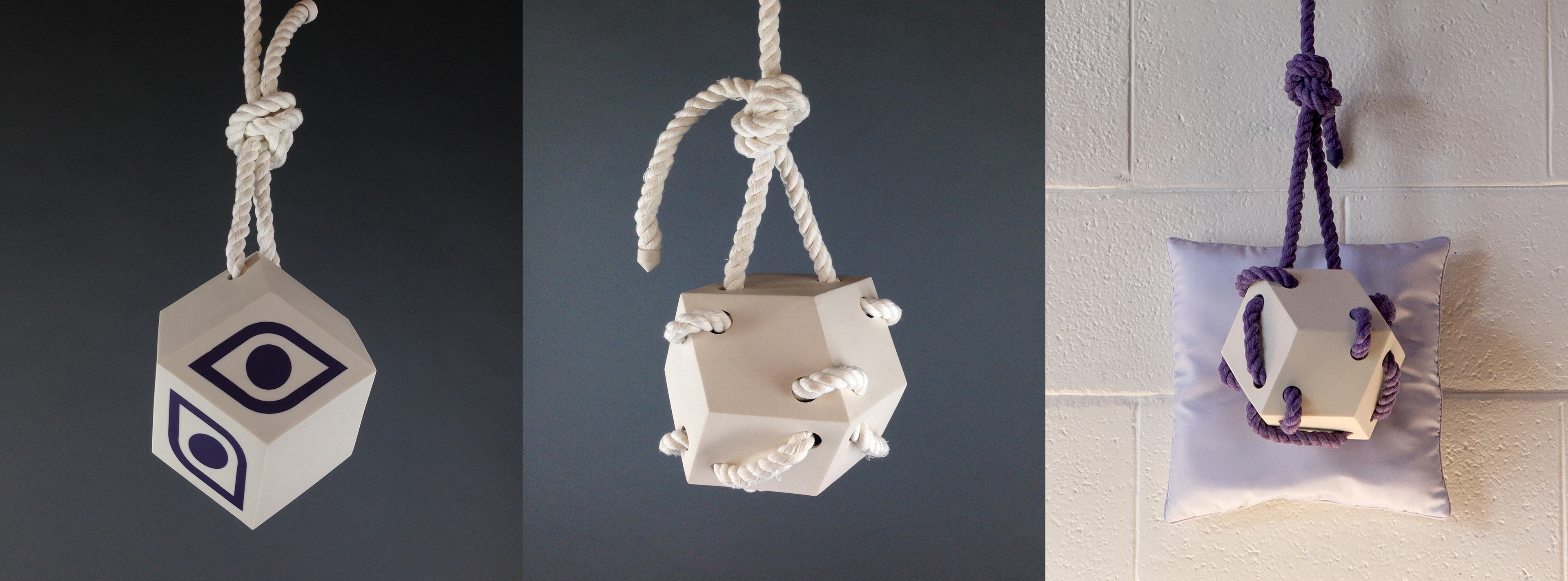 Three sculptures from solo show "Inviolate," 2013. Polished purple and white porcelain, cotton rope, silk.