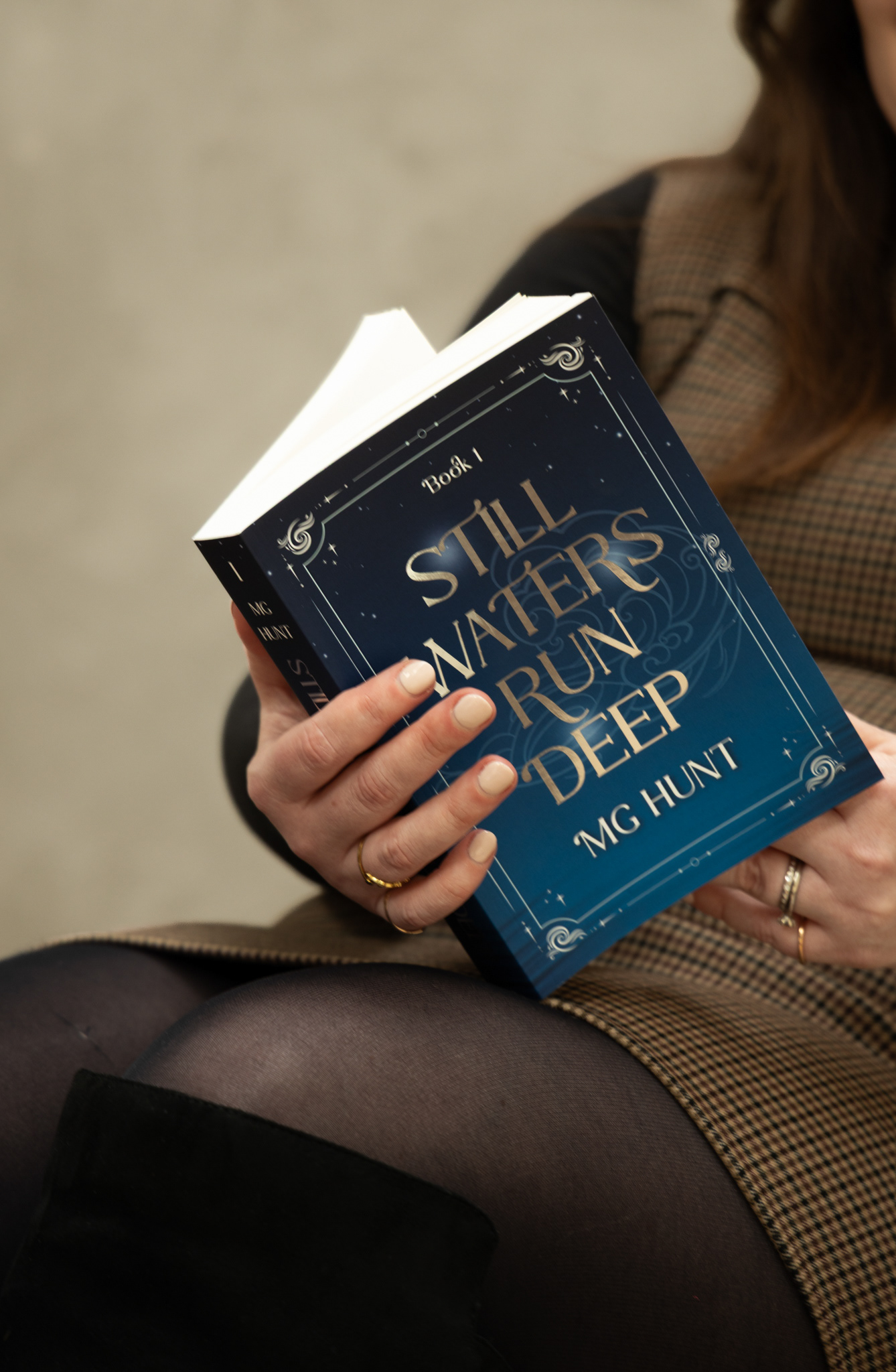 Still Waters Run Deep: Book 1, paperback with silver foil on cover and spine.
