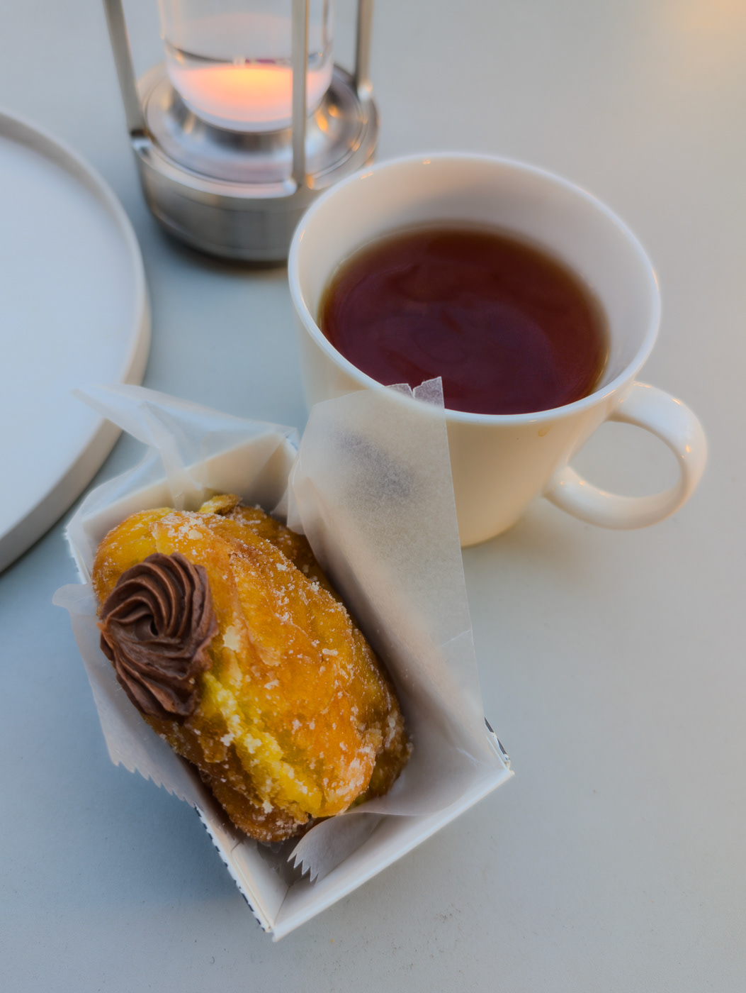 Black tea and chocolate donut