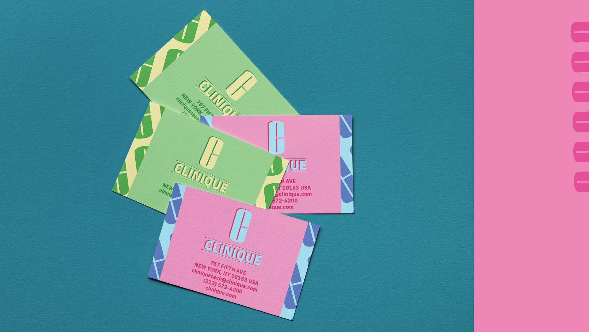 clinique business cards in a pile.