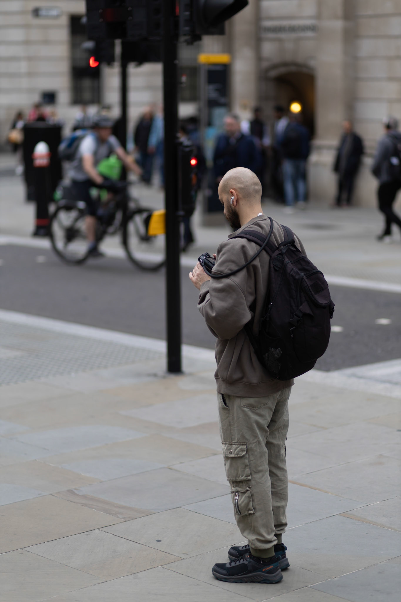 Photgrpher standing outside Bank Station