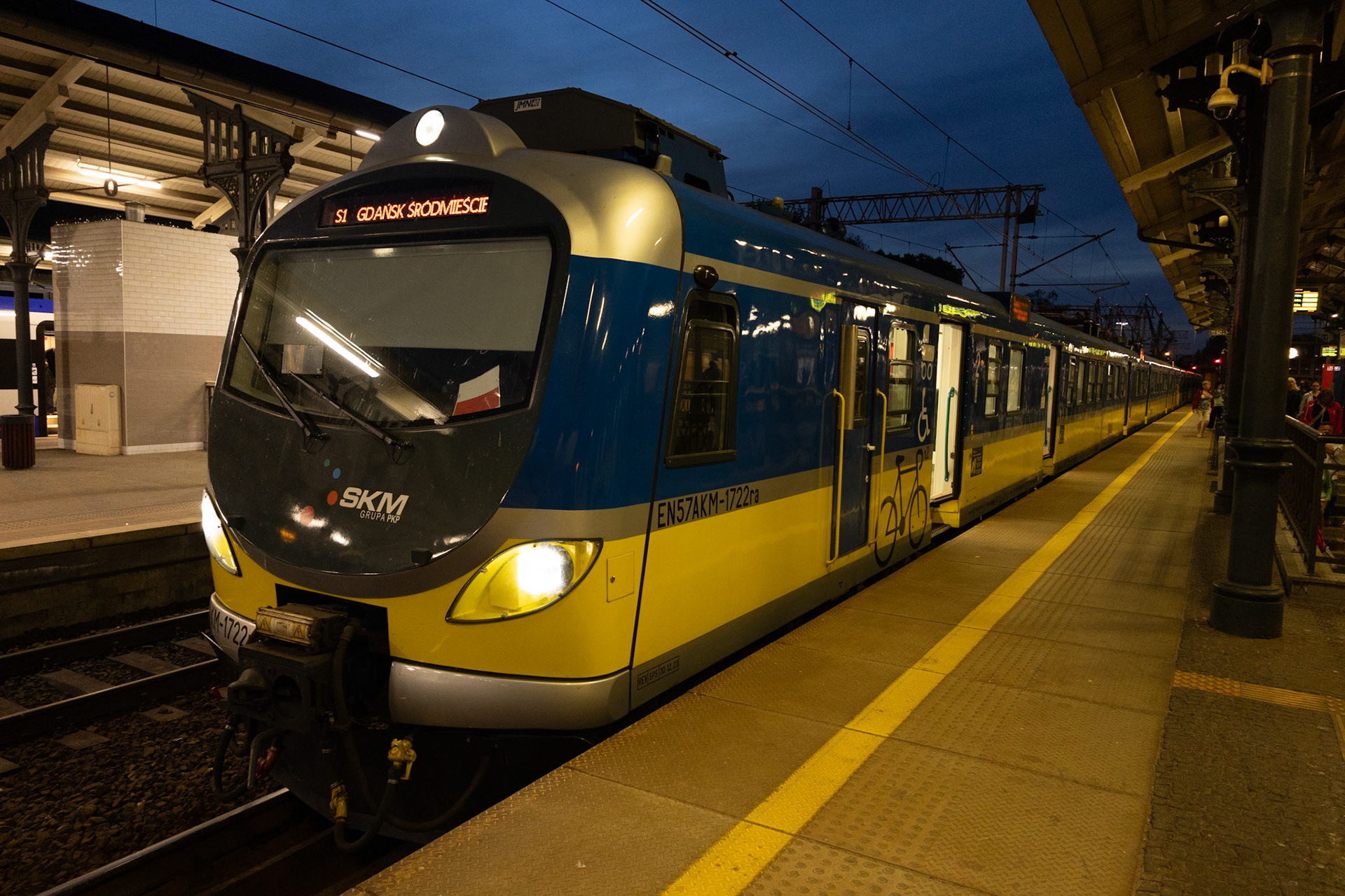Modern electric commuter train about to leave Gdańsk, Poland