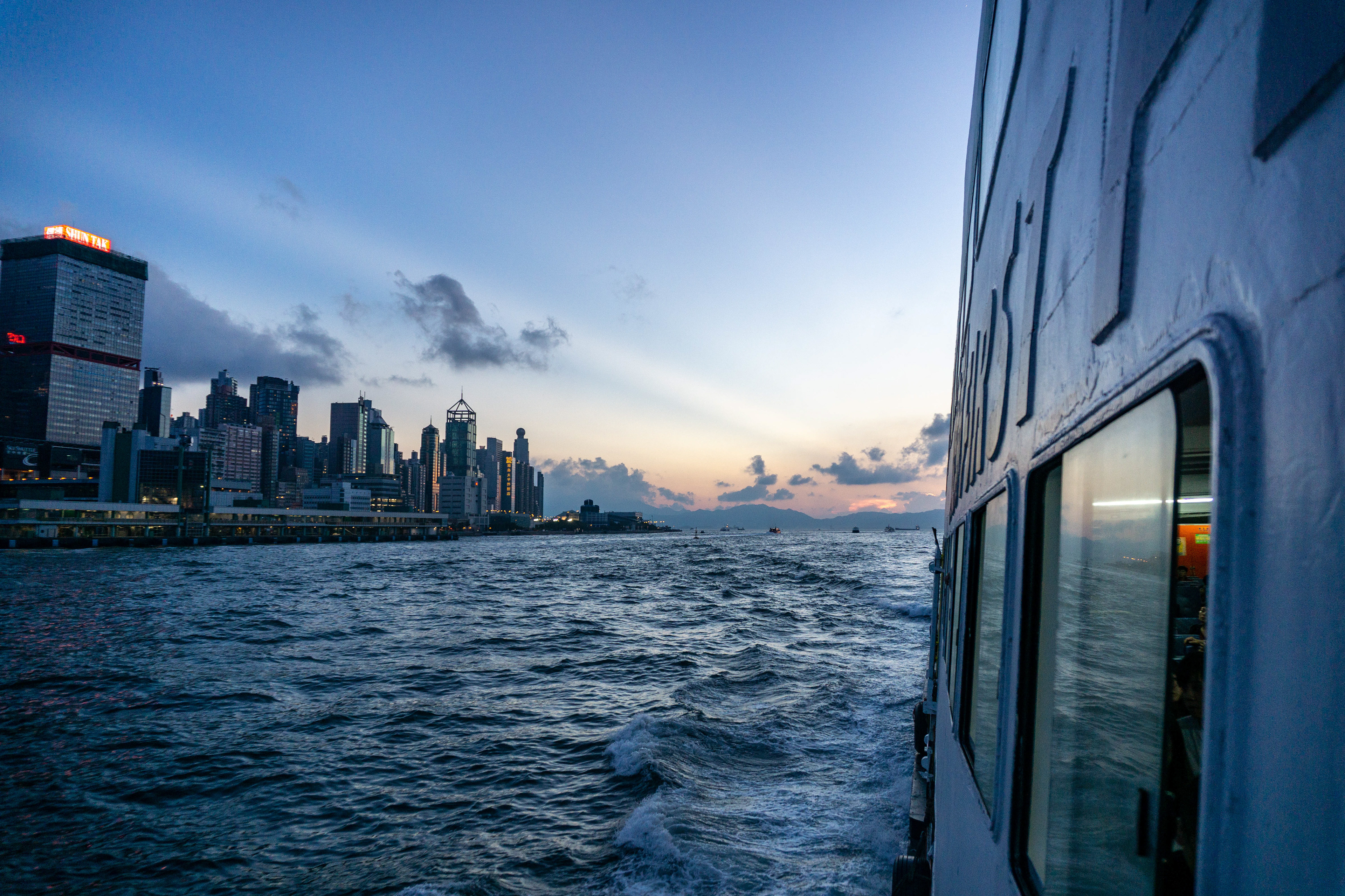 Ferry ride in Hong Kong with a view of the skyscrapers