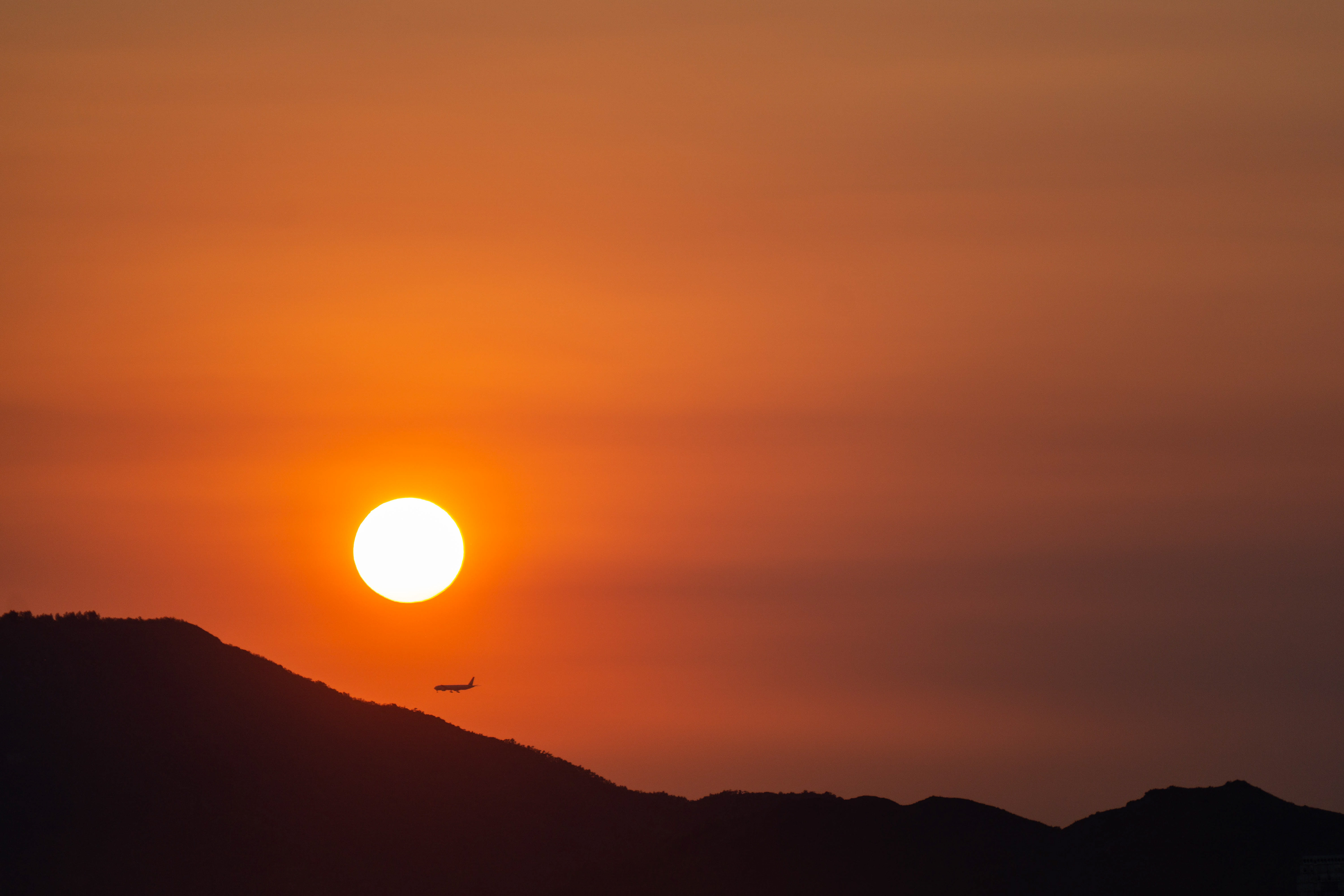 Sun setting over the hills close to the airport