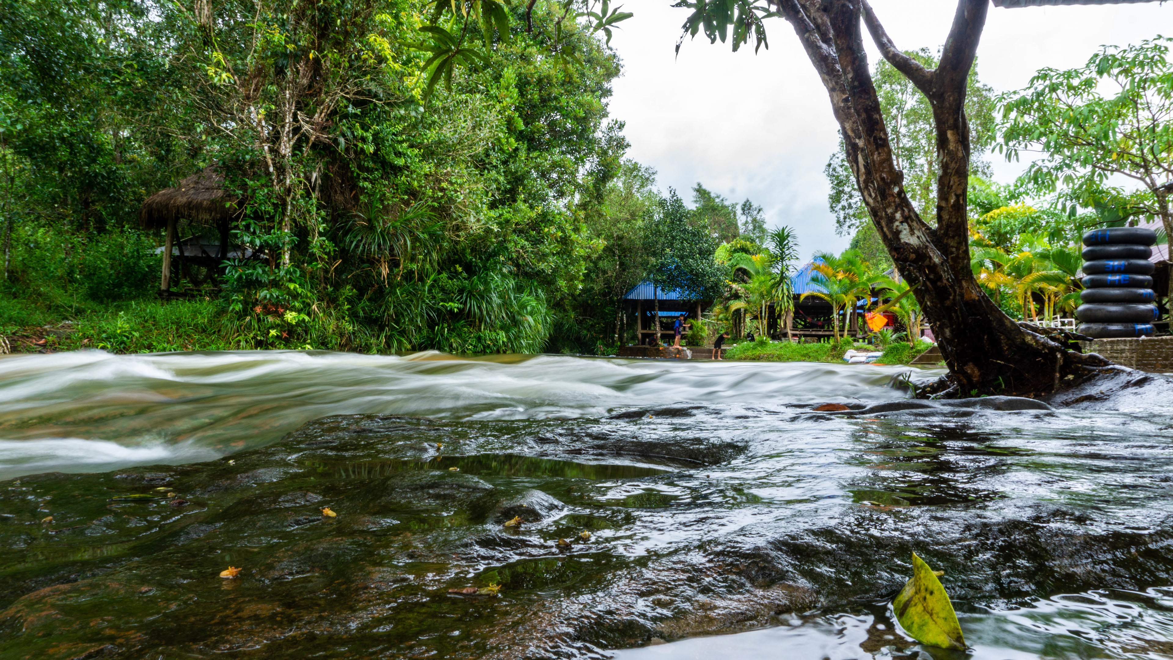 River running through a town in rainy season