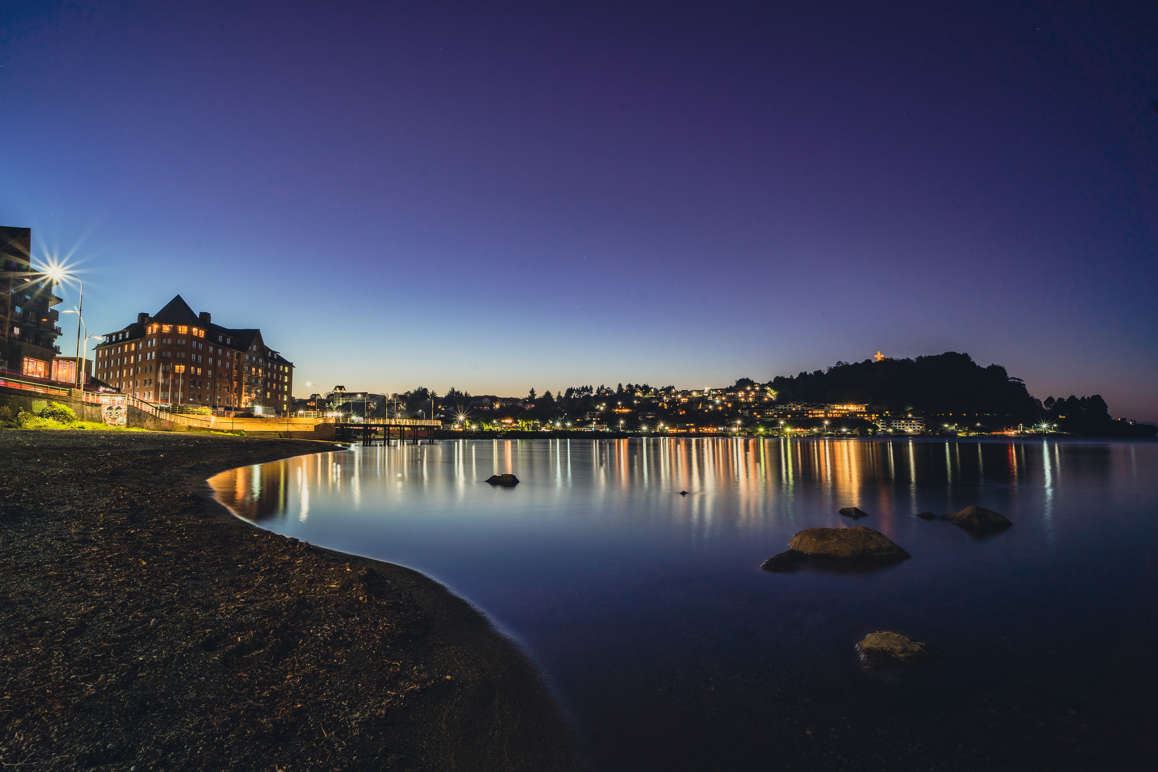 The lake coast of Puerto Varas in southern Chile shortly after sunset