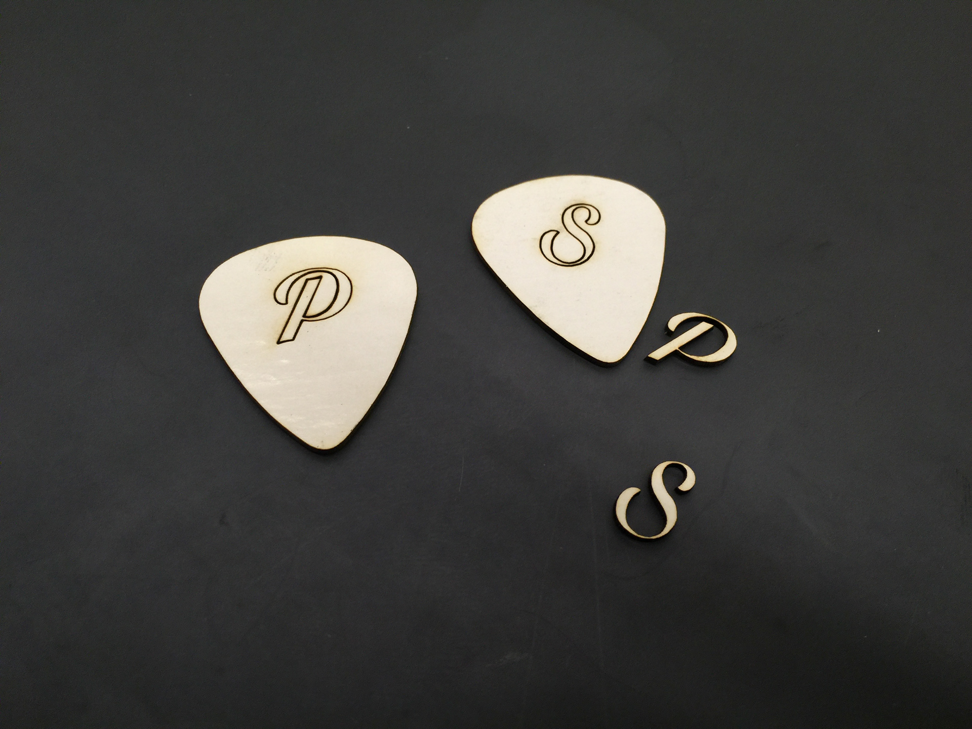 Pick body with inlay pieces