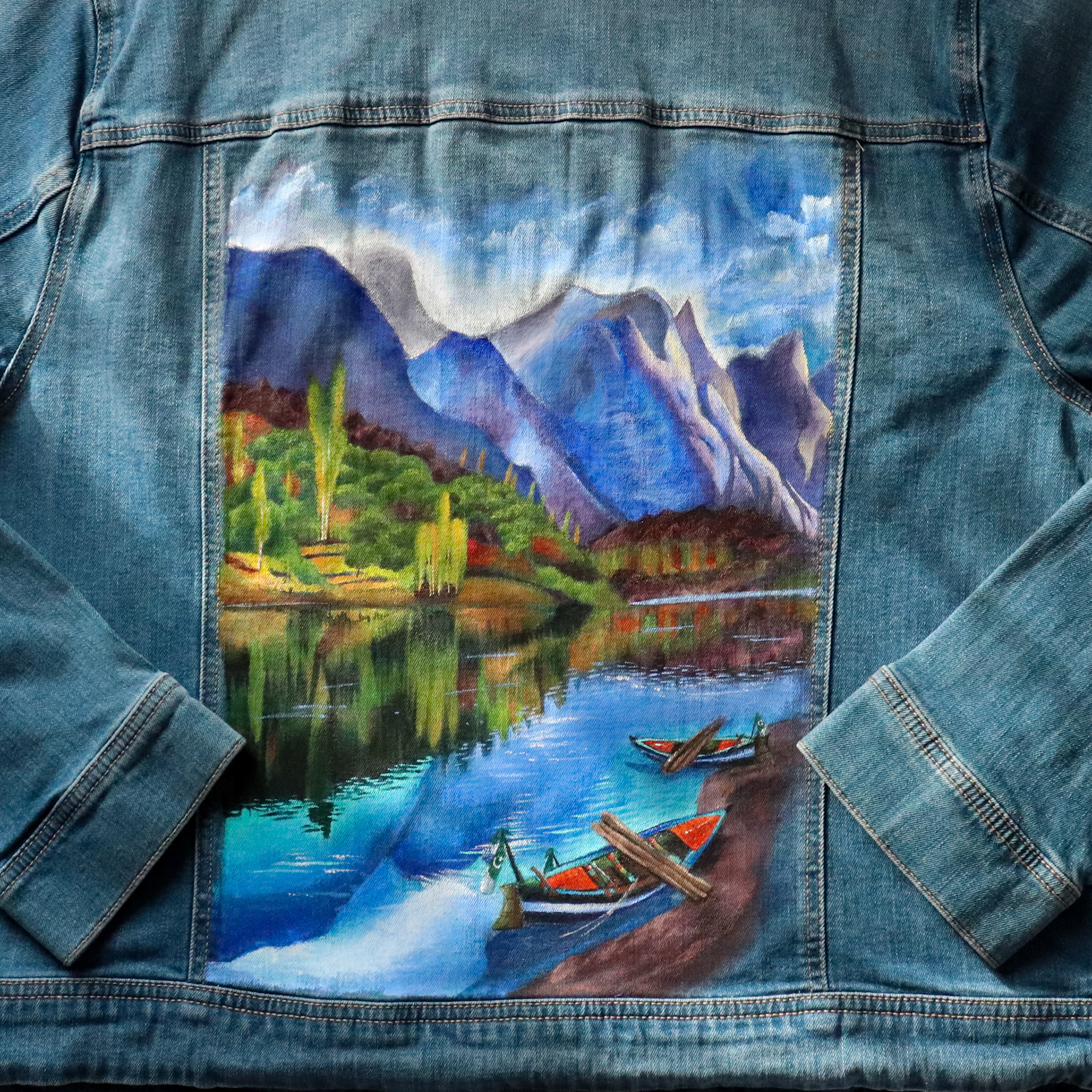 Acrylic landscape painting on denim of Hunza Valley, Pakistan.
