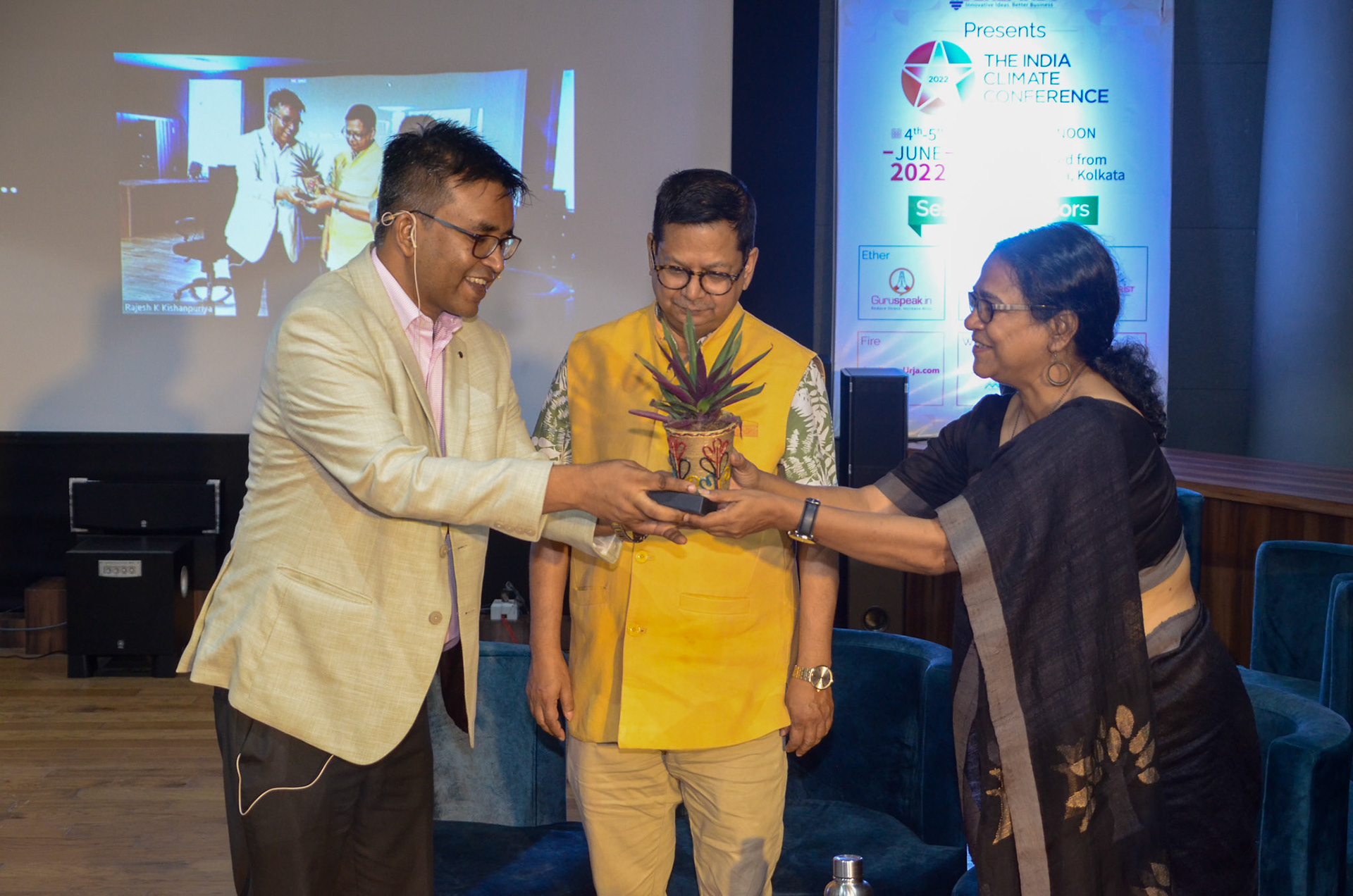 Rajesh Kishanpuriya gifting a sapling to Ms. Ajanta Dey, Joint Secretary & Programme Director , Nature Environment & Wildlife Society (NEWS) in presence of Shri Debashis Sen, MD, West Bengal Housing Infrastructure Development Corporation (WBHIDCO) on 5th June 2022