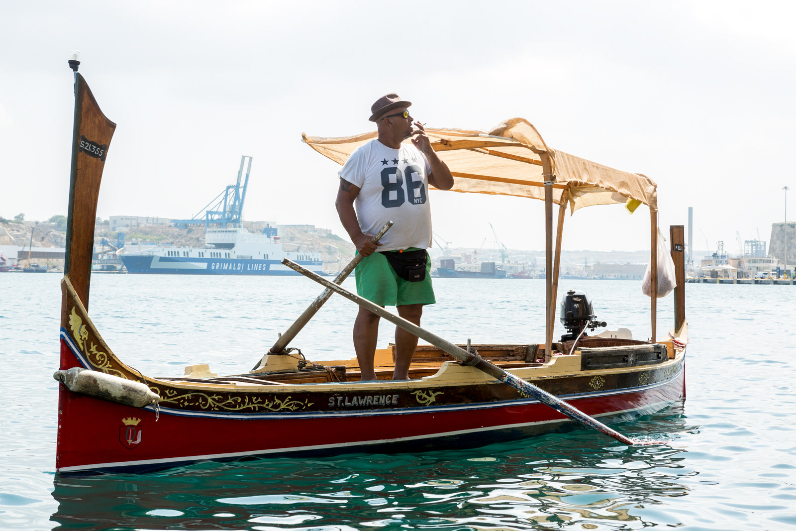 Smoking ferry captain, Valletta, Malta