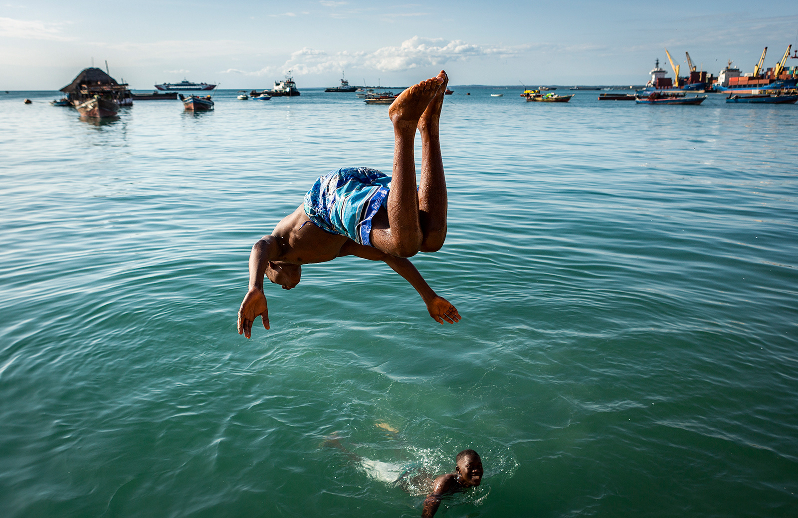 Boys cooling off, Stonetown, Zanzibar, Tanzania