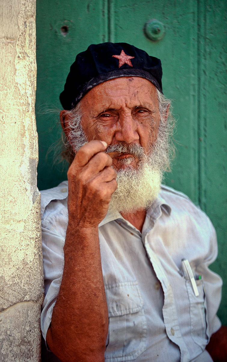 Man with red star hat and pipe, Havana, Cuba