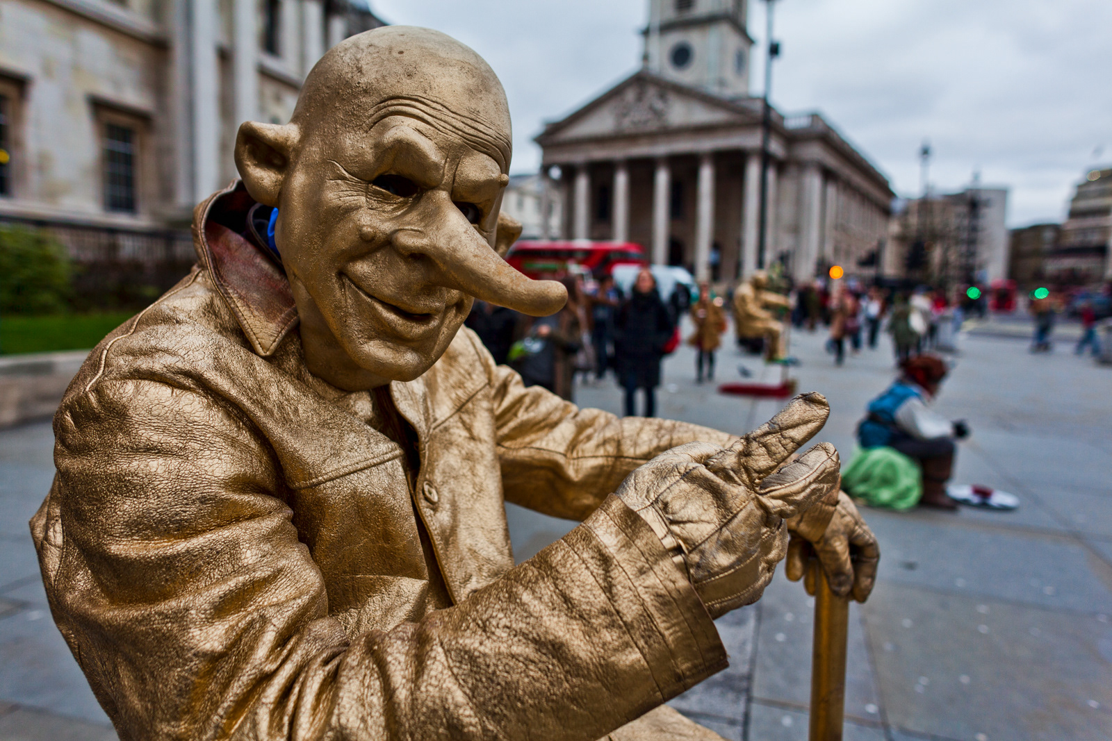 Masked busker, Trafalgar Square, London, England, UK