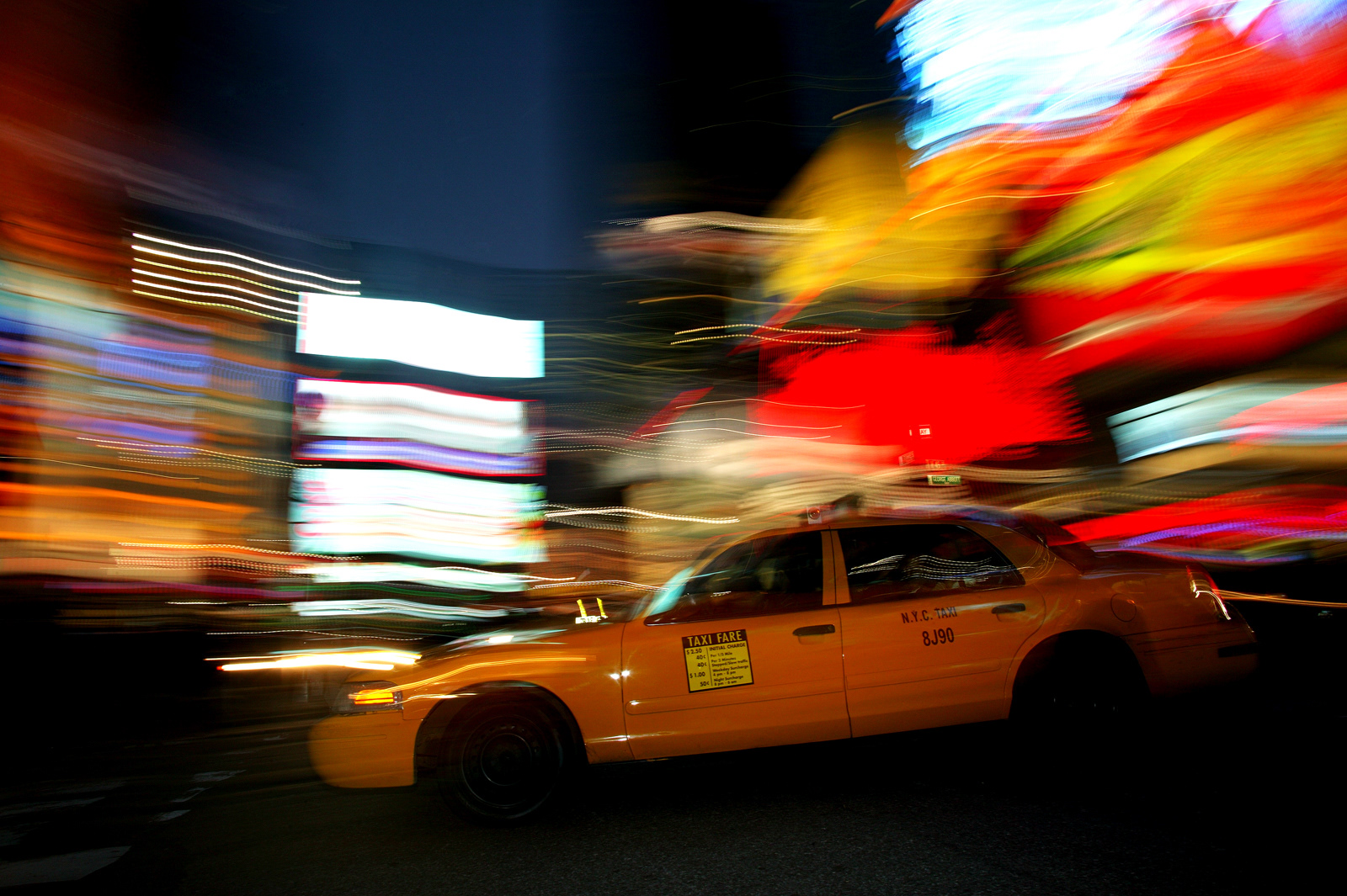 Blurred taxi, Time Square, New York, USA