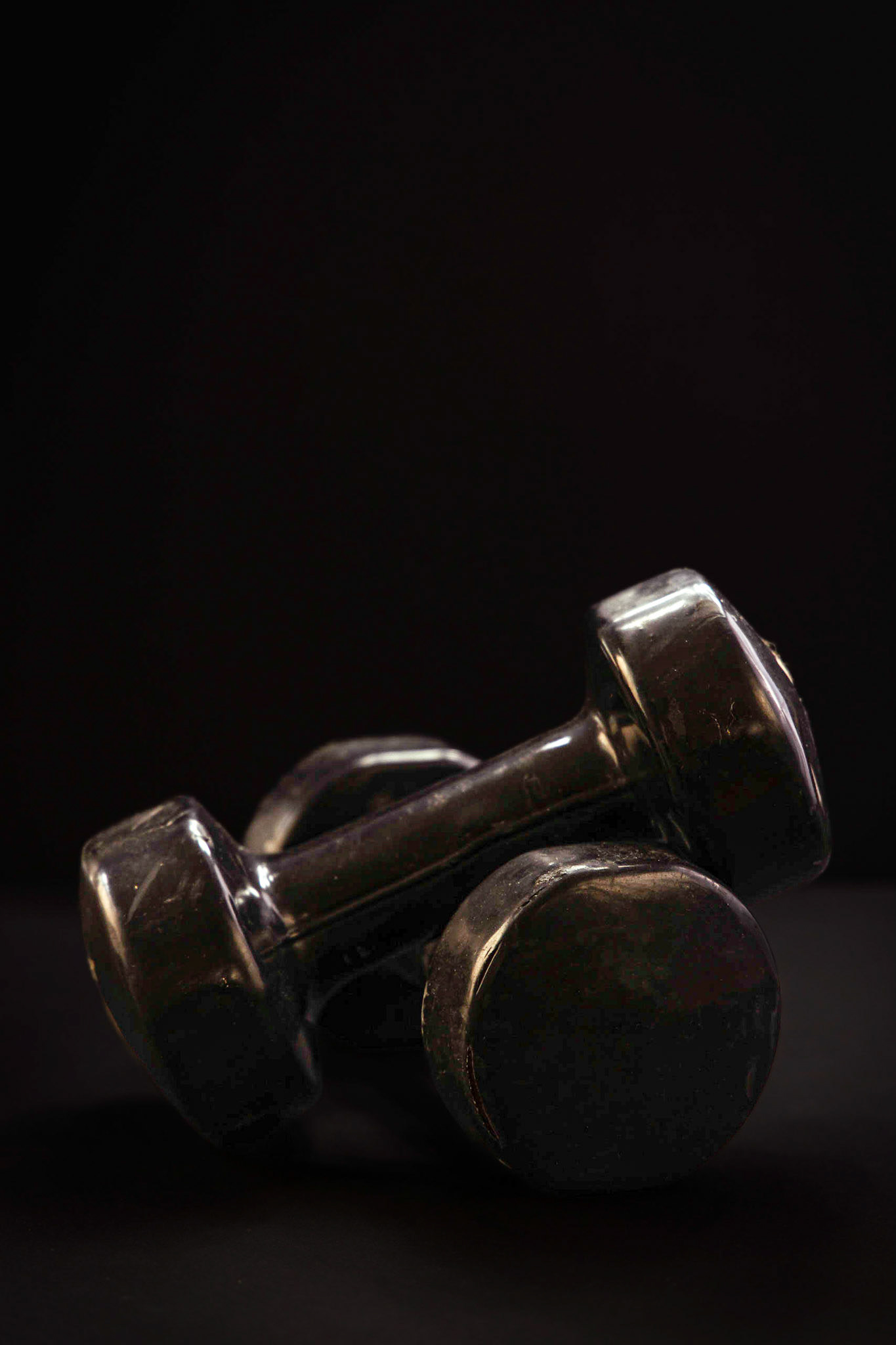 Dumb bells on a black backgraound